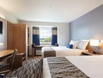 Queen Room with Two Queen Beds and Roll-In Shower - Mobility/Hearing Accessible - Non-Smoking in Microtel Inn and Suites by Wyndham Monahans