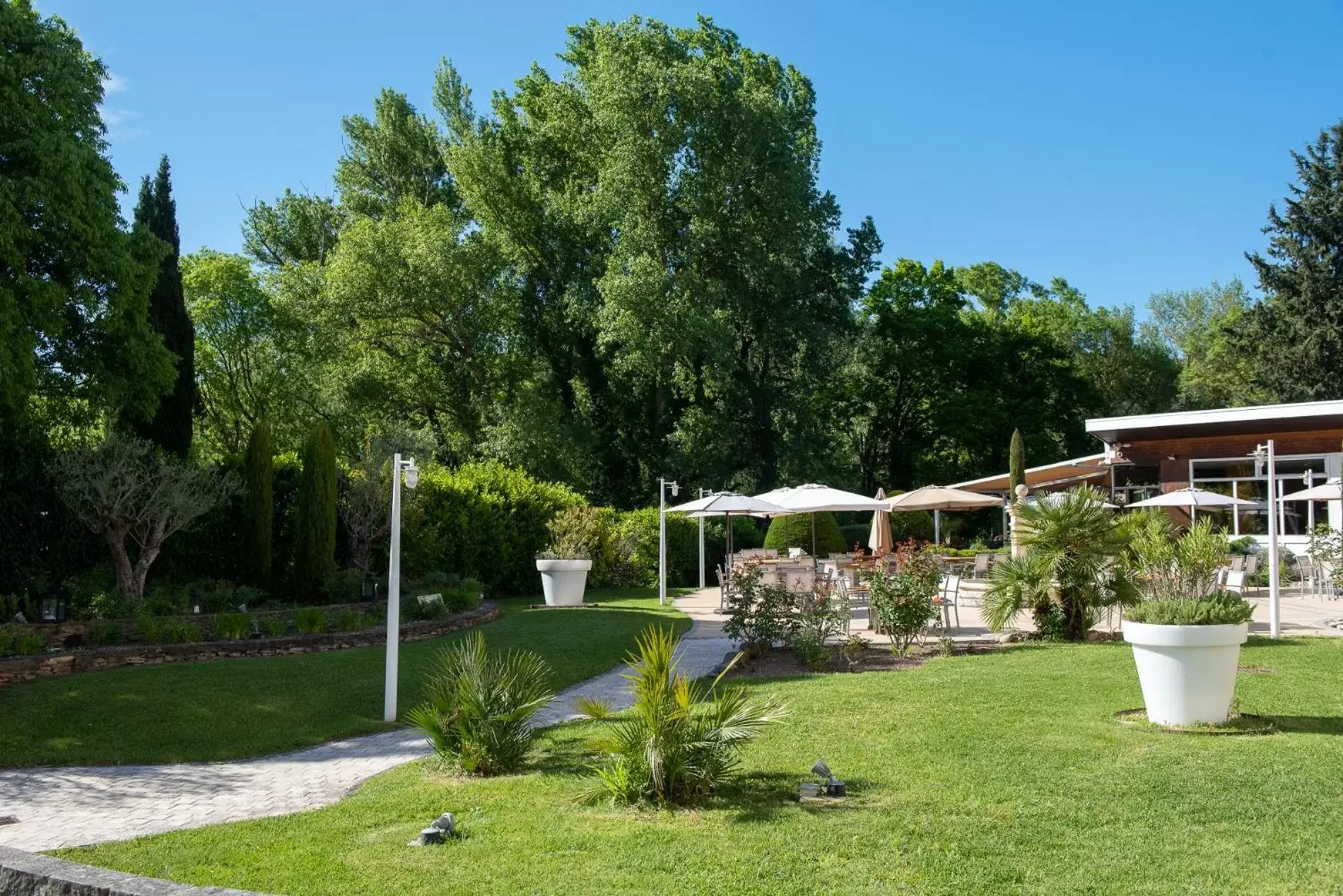 Patio, Garden in Novotel Aix-en-Provence Pont de L'Arc