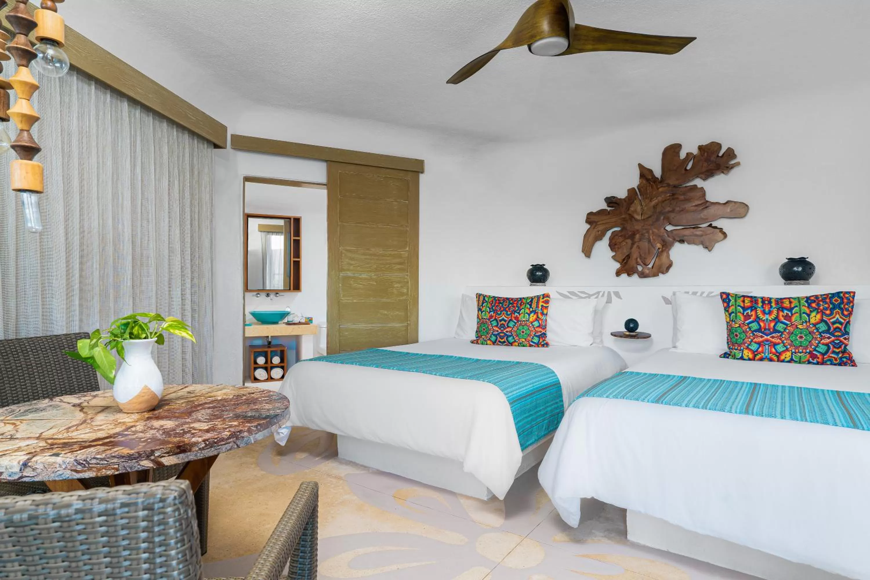 Bed in Mahekal Beach Front Resort & Spa