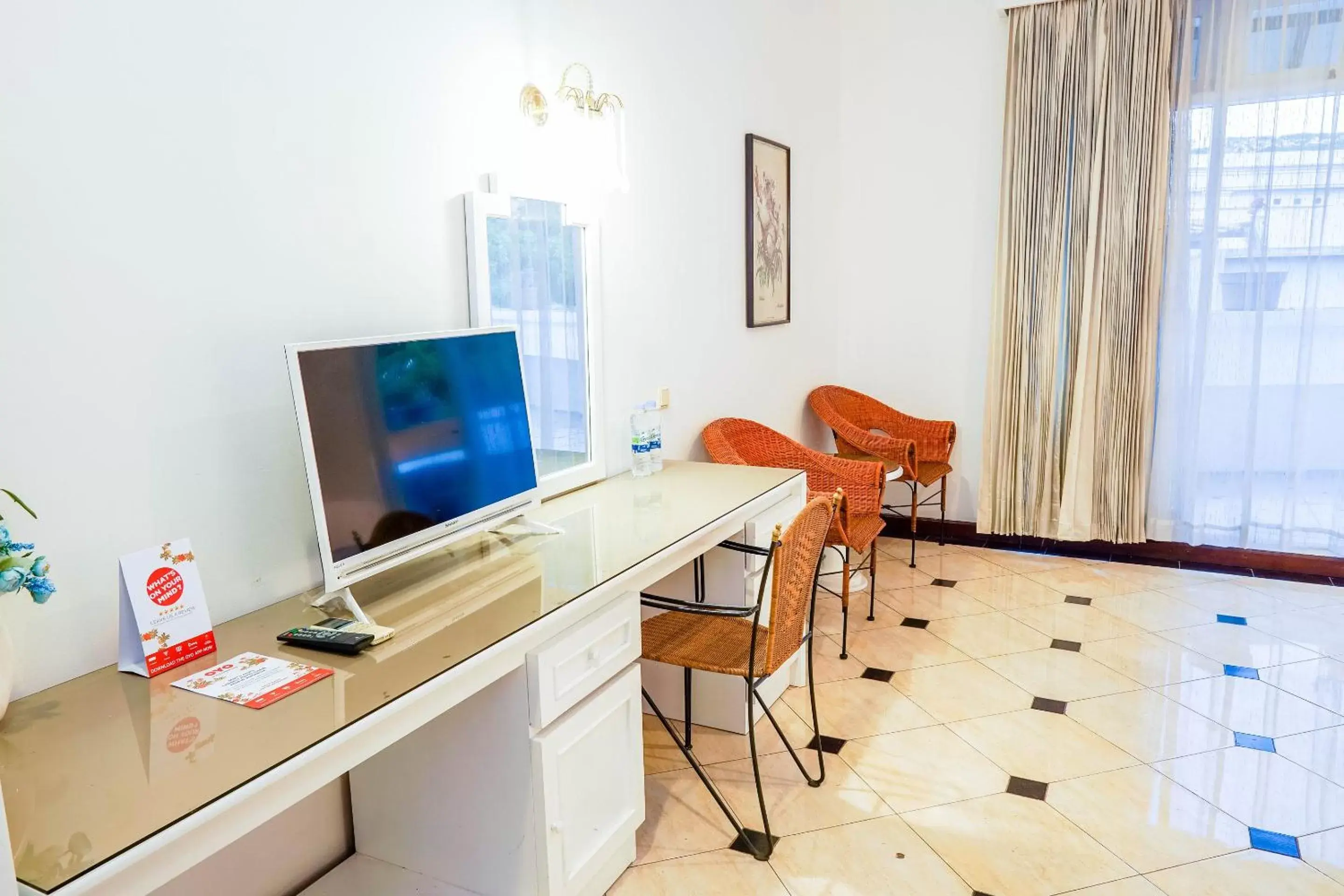 TV and multimedia, TV/Entertainment Center in SUPER OYO Collection O 1452 Hotel Utari