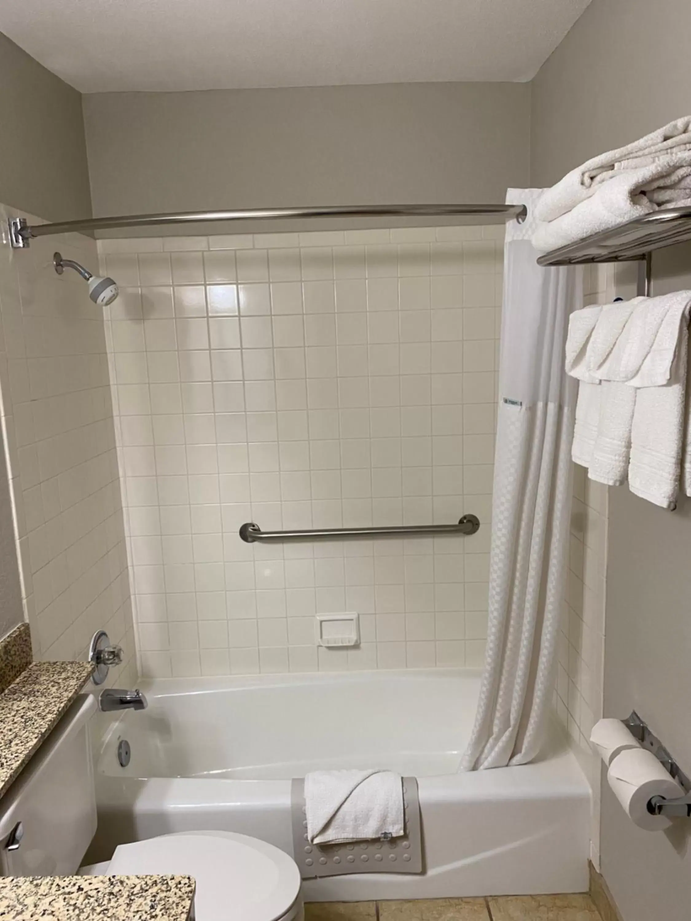 Bathroom in Days Inn & Suites by Wyndham Des Moines Airport