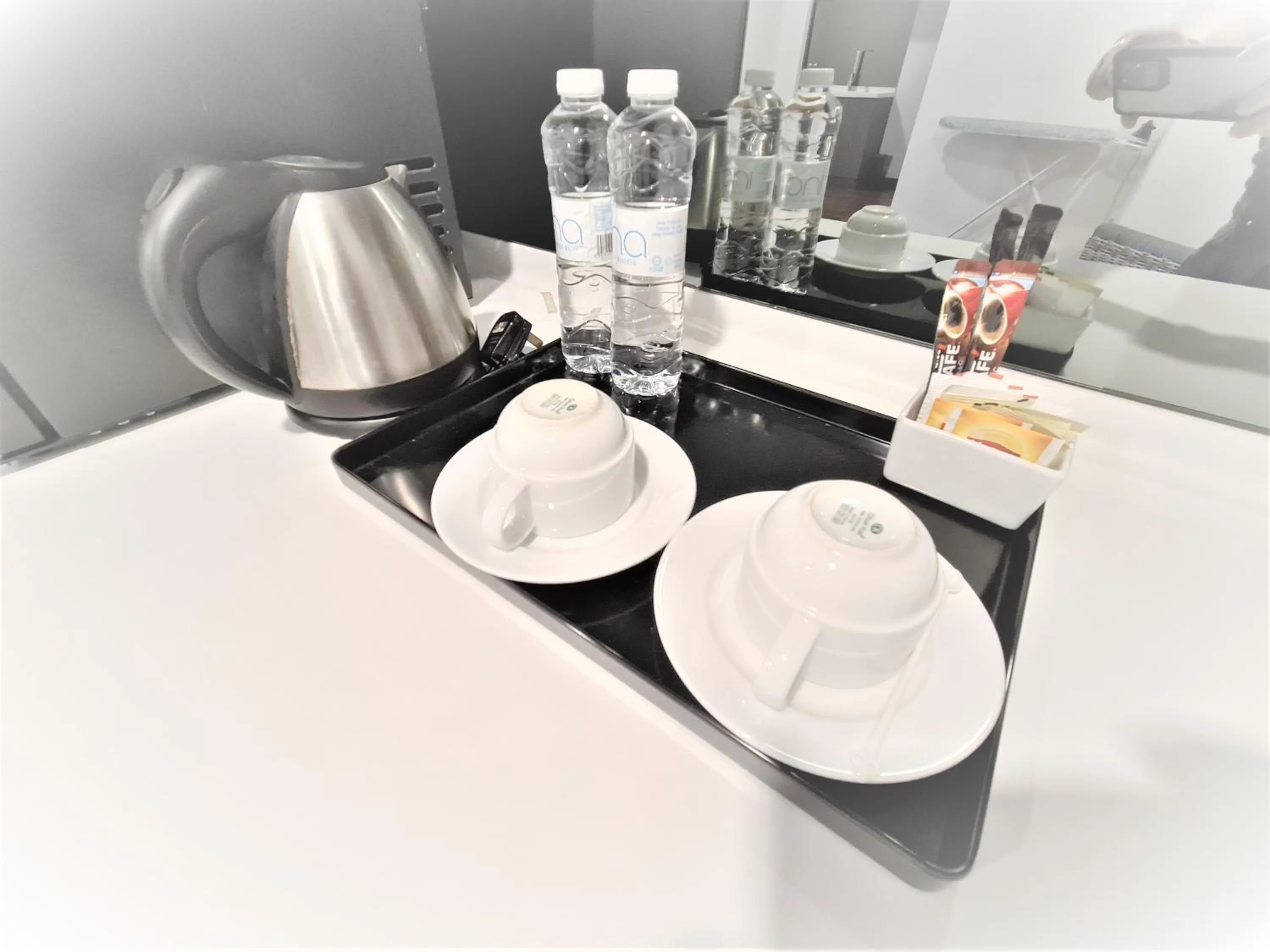 Kitchen or kitchenette in Nexus Regency Suites & Hotel