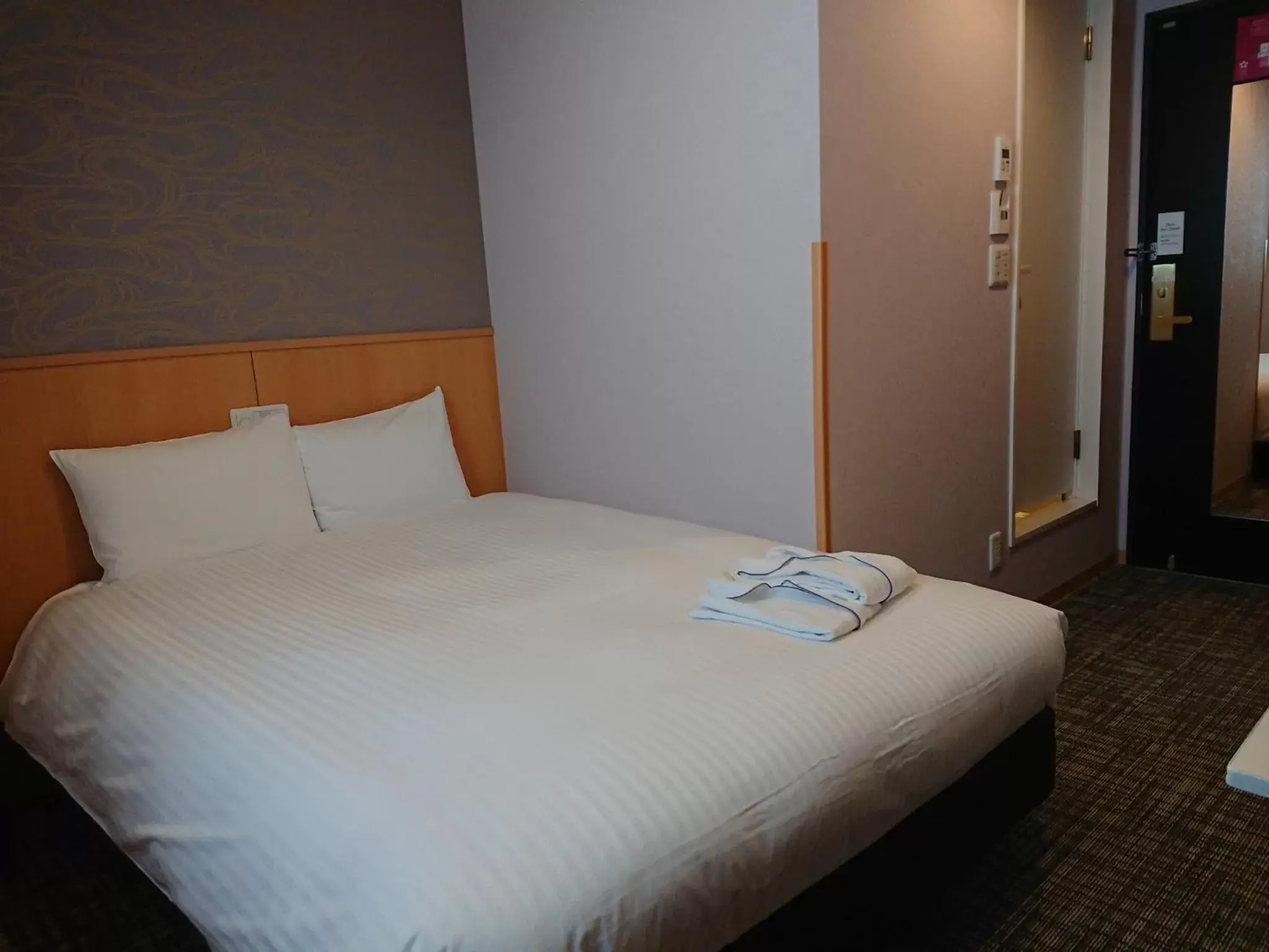 Bed in SAKURA SKY HOTEL KASHIWA(桜スカイホテル柏) Bed in SAKURA SKY HOTEL KASHIWA(桜スカイホテル柏)