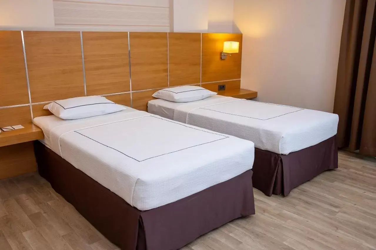 Bed in Anemon Adana Hotel