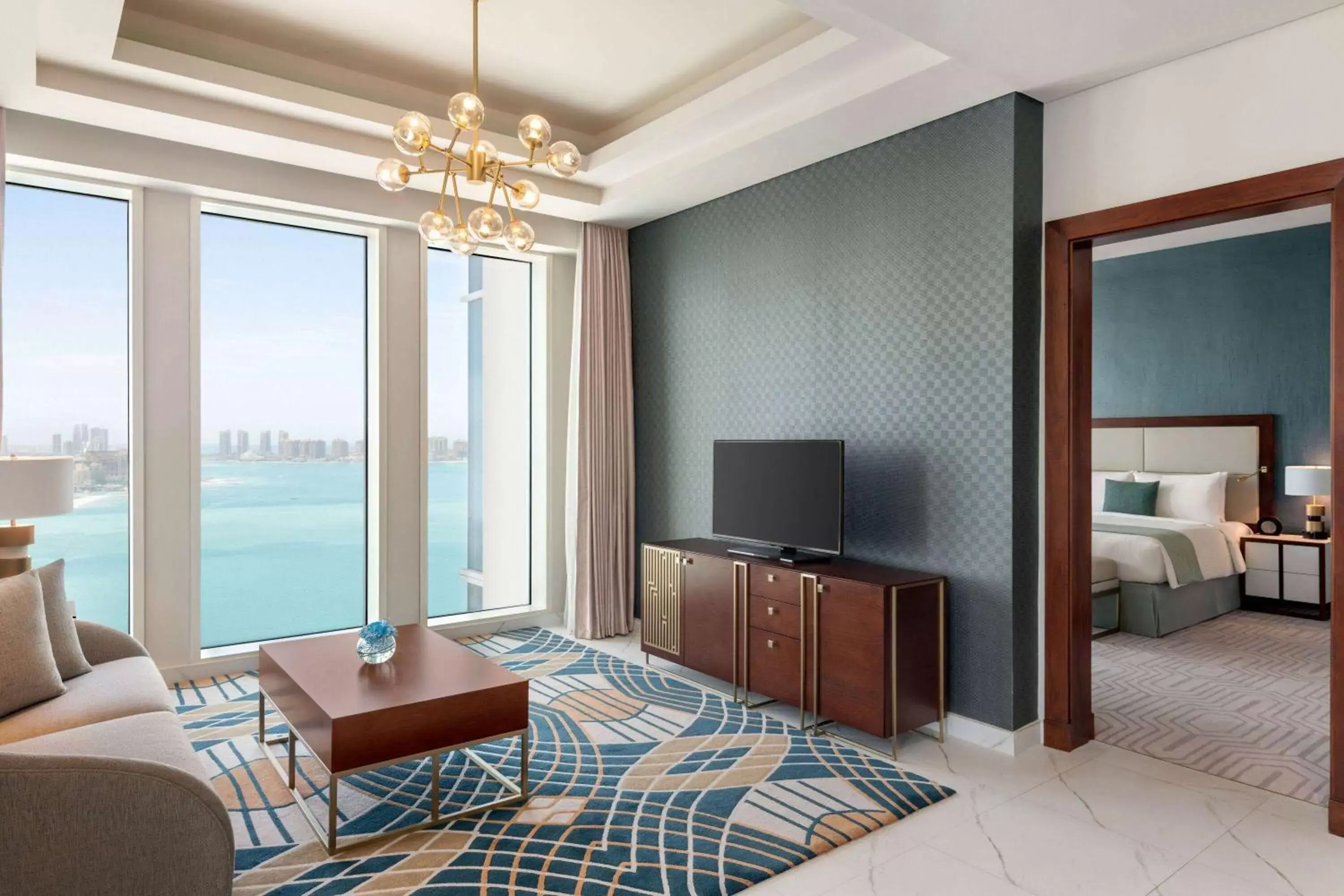 Bed, TV/Entertainment Center in Wyndham Grand Doha West Bay Beach