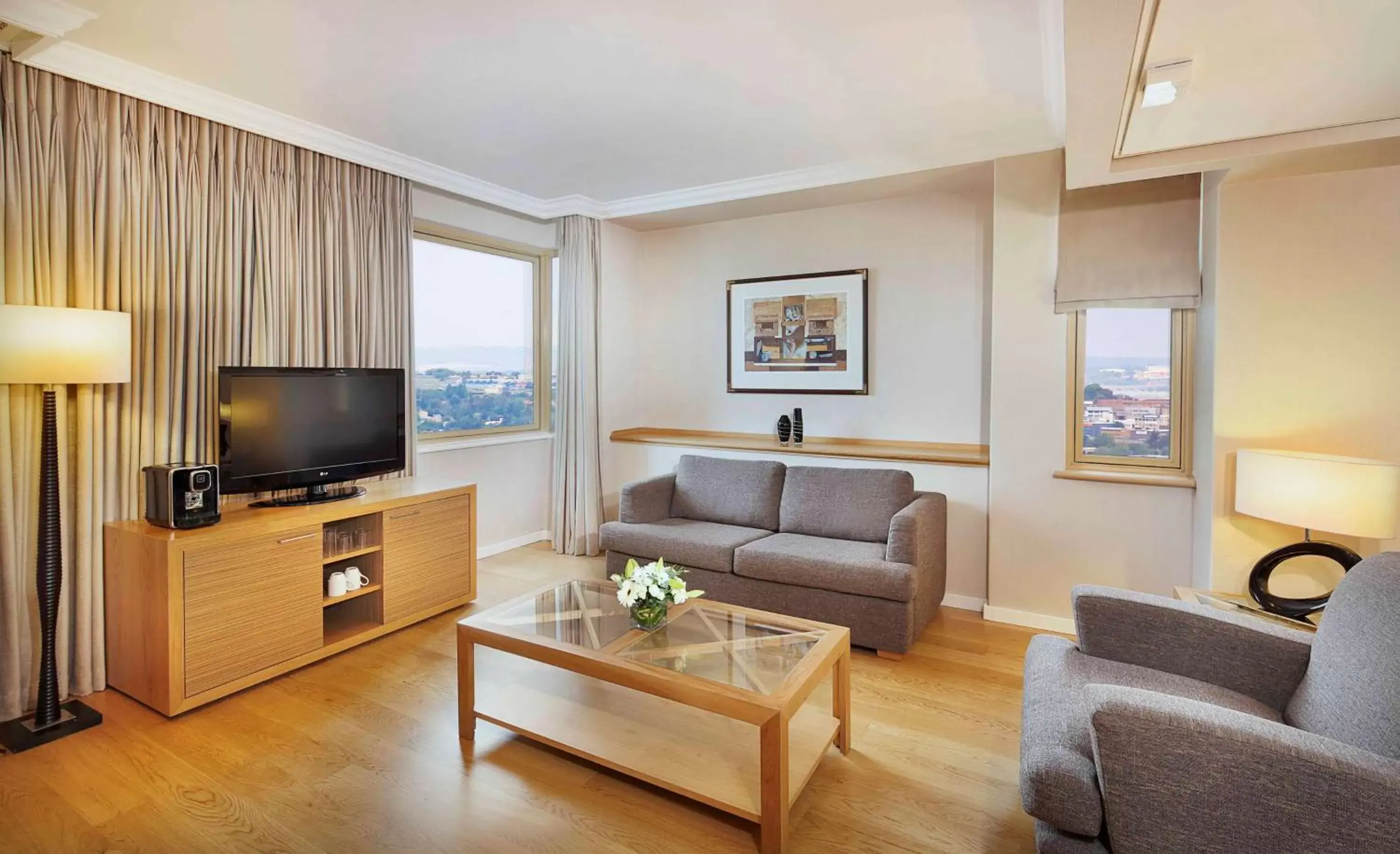 Bedroom, Seating Area in Hilton Sandton