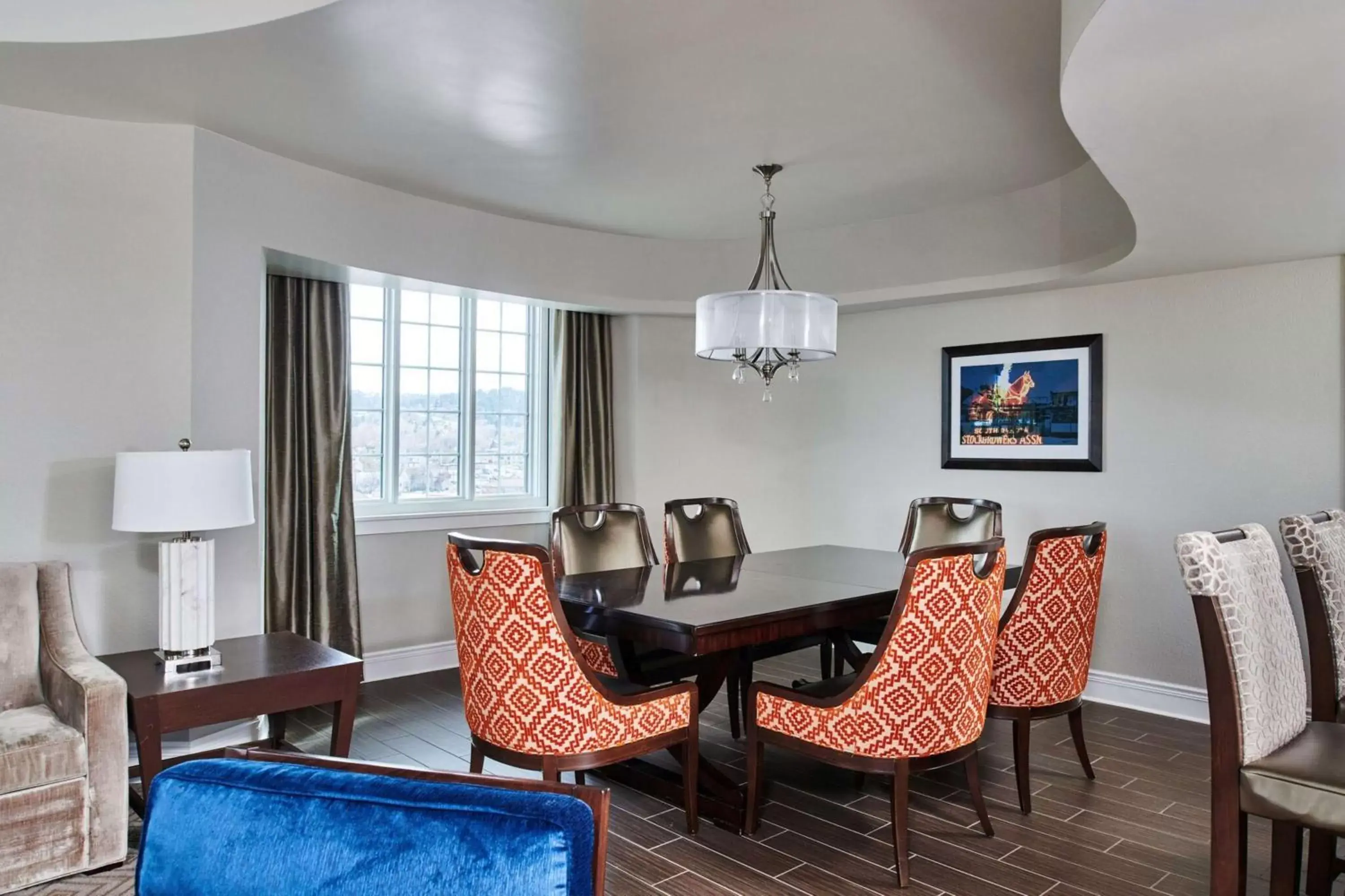 Living room, Seating Area in Hotel Alex Johnson Rapid City, Curio Collection by Hilton