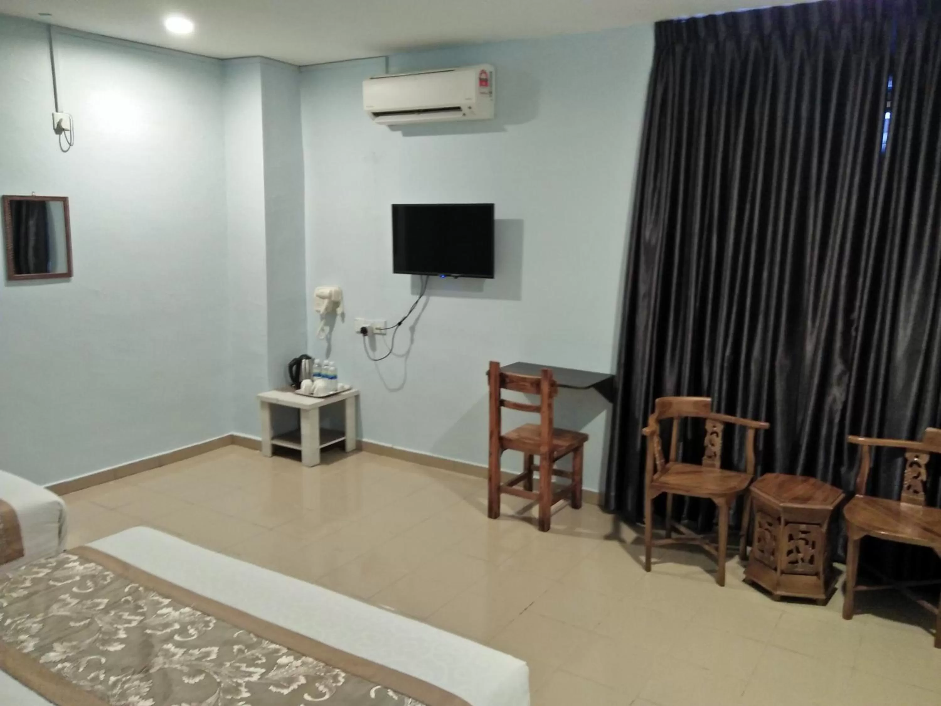 Seating area in TIONG HUA HOTEL