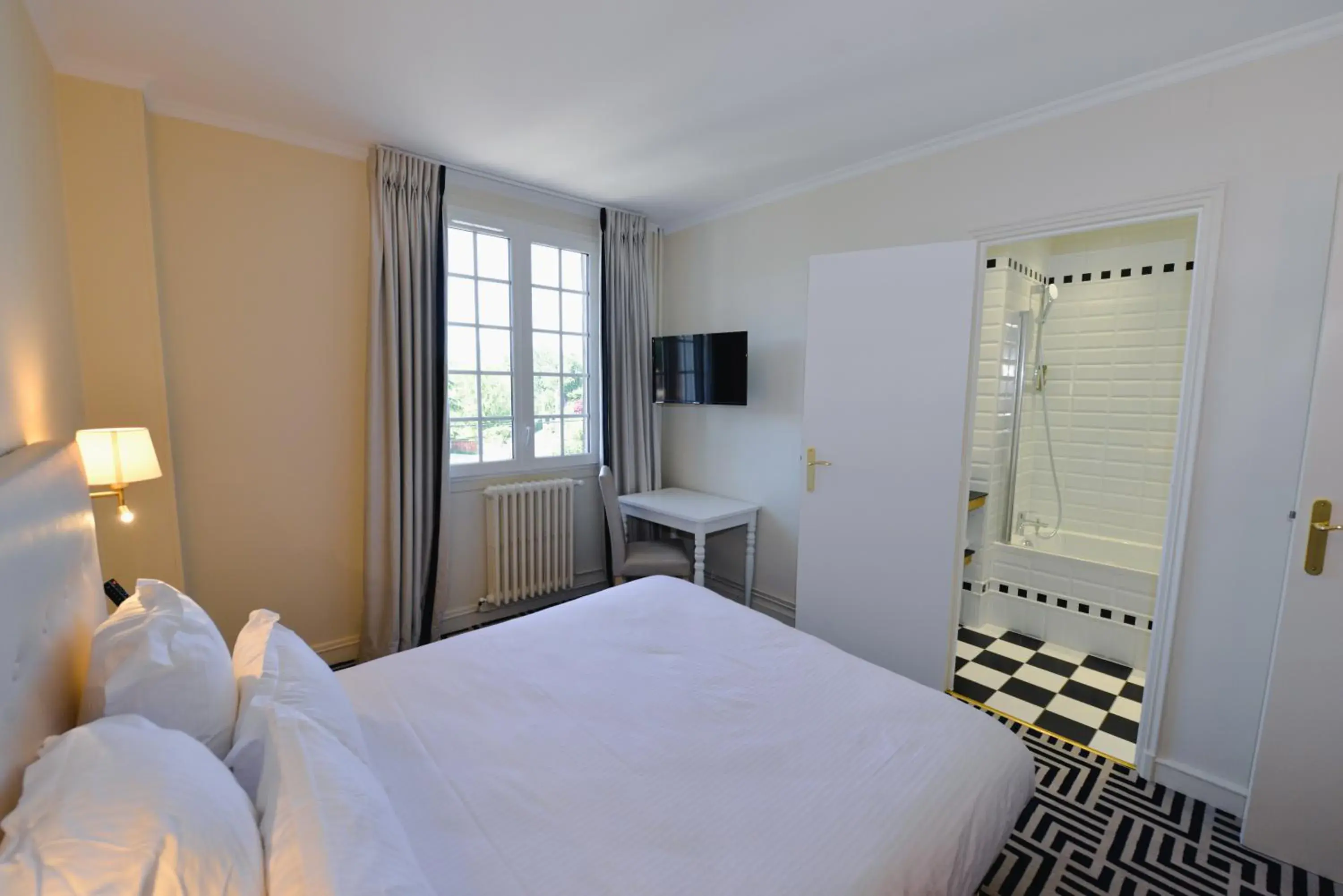 Double or Twin Room with Village View - single occupancy in Logis Hostellerie Saint Pierre