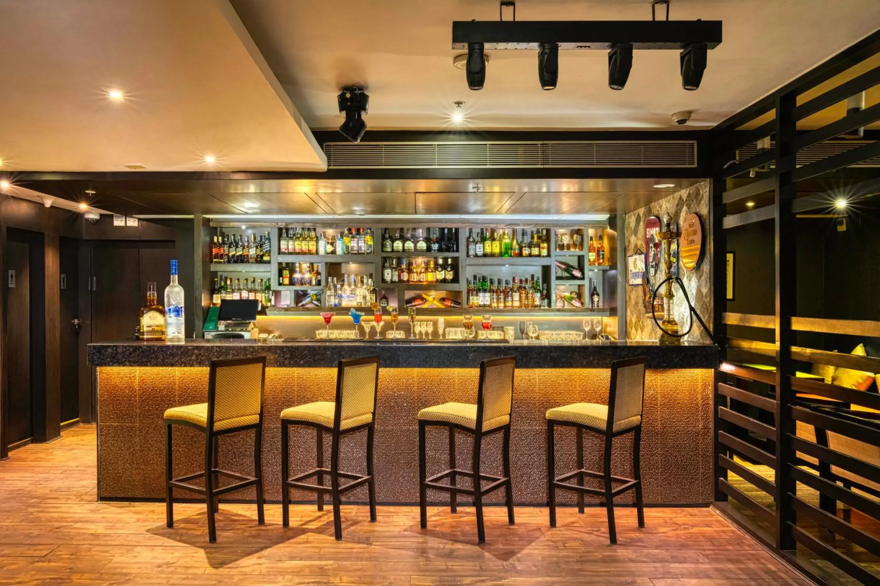 Lounge or bar in Holiday Inn Kolkata Airport by IHG Lounge or bar in Holiday Inn Kolkata Airport by IHG