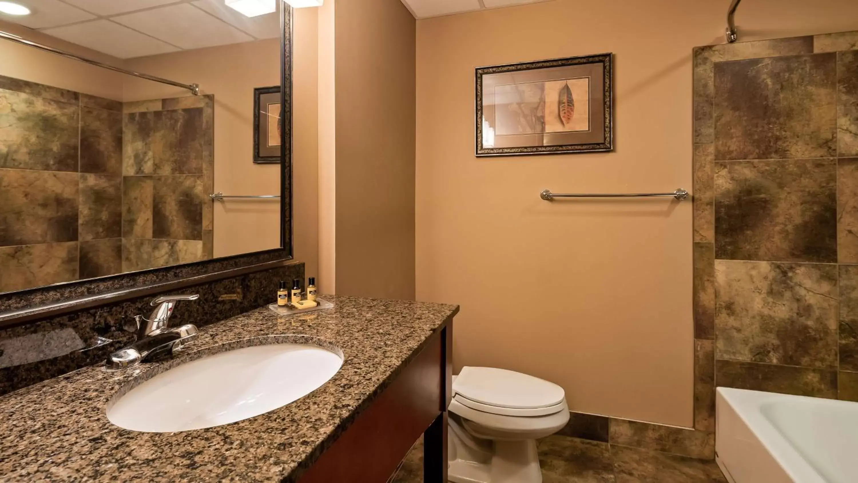 Photo of the whole room, Bathroom in Best Western Plus Bloomington Hotel