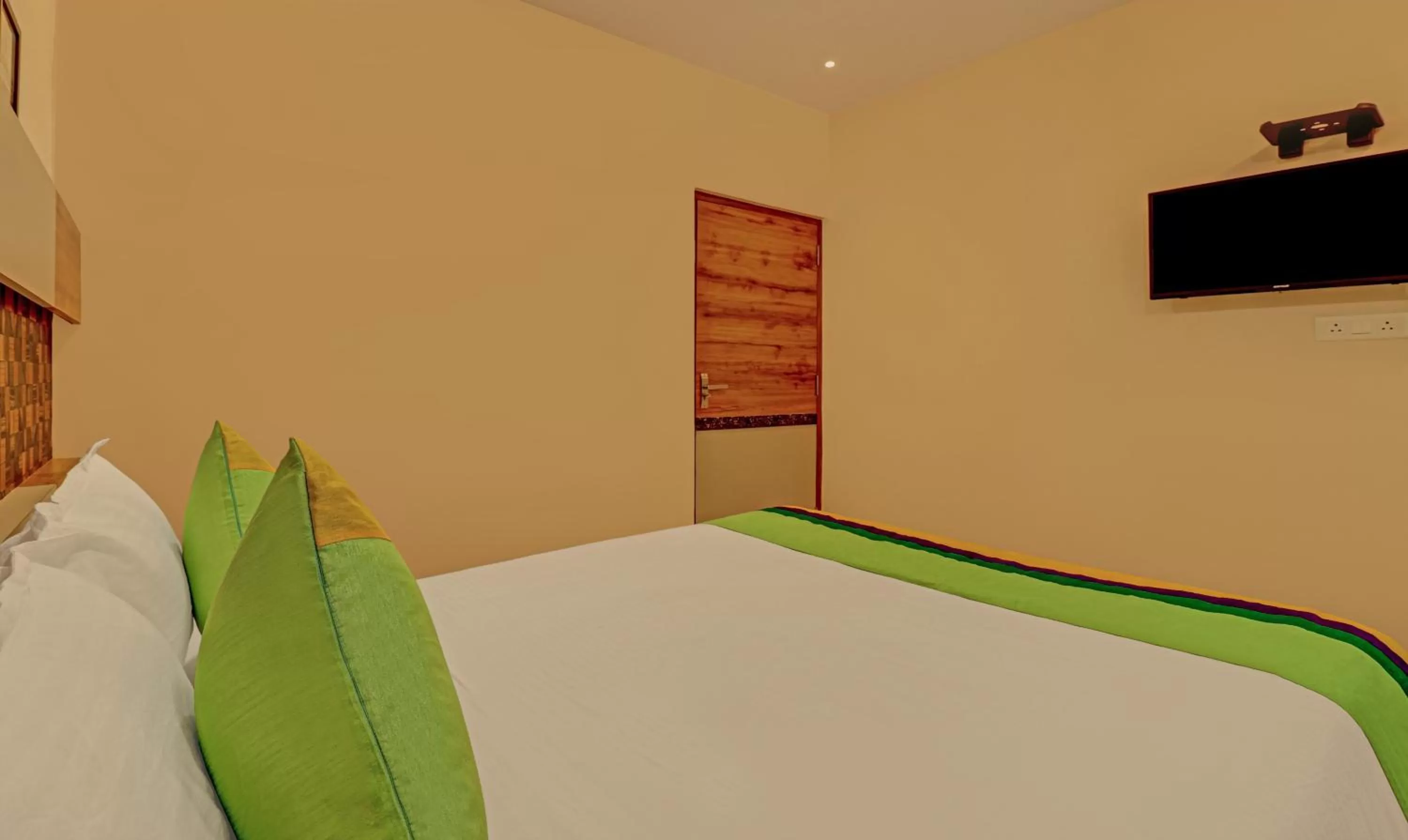 Bedroom, Bed in Treebo Rainbow Grand