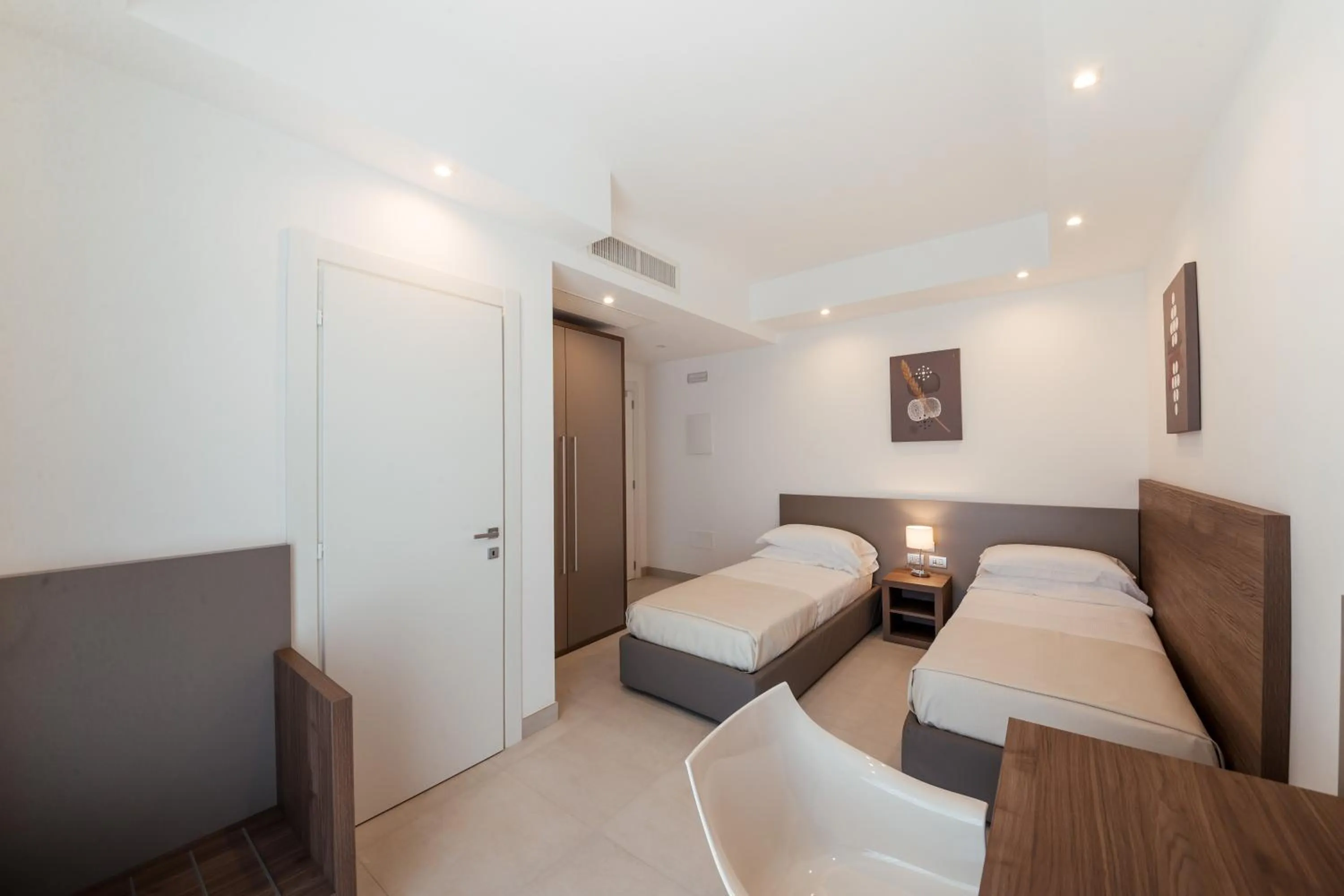 Bed in Grieco Business & Spa Hotel