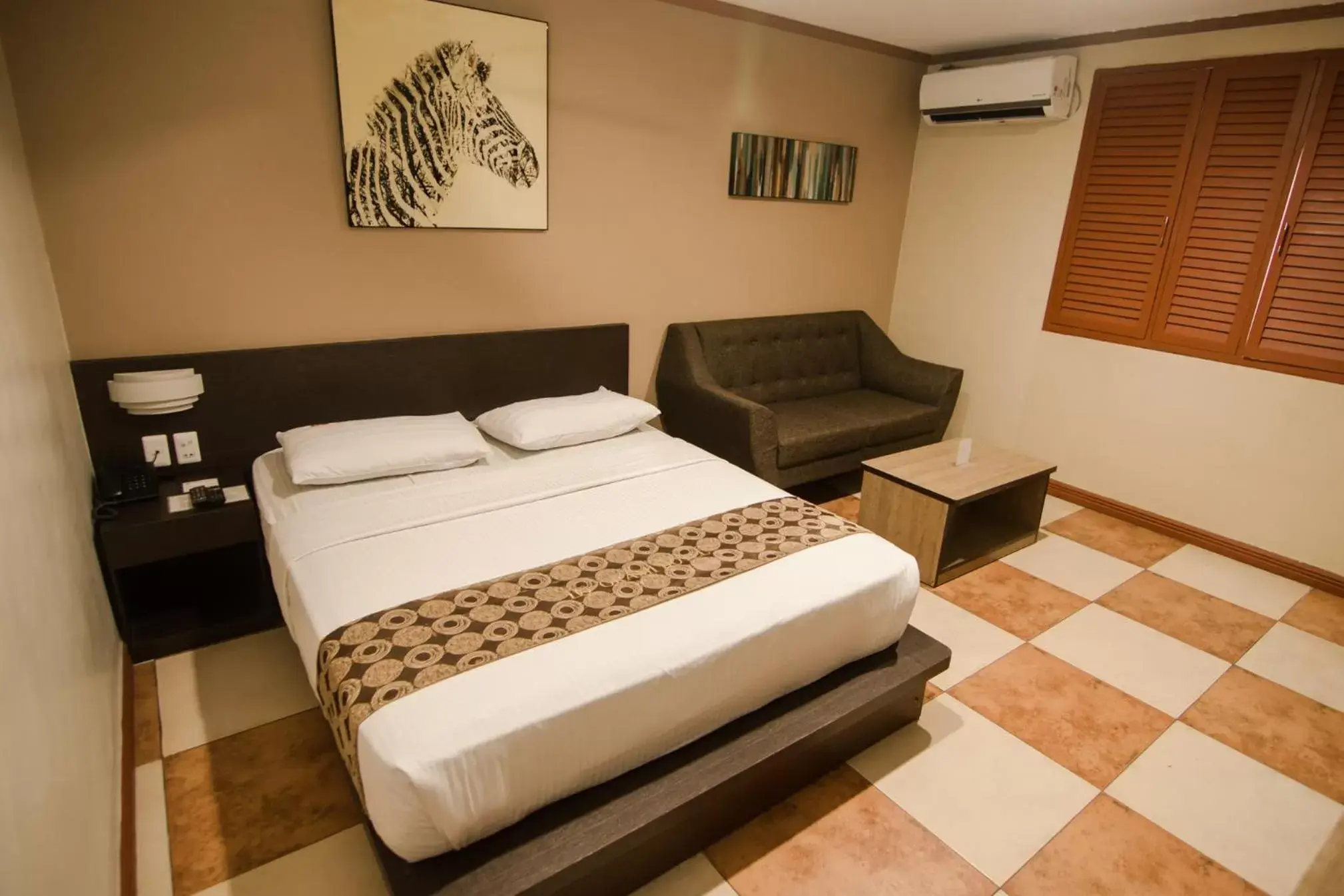 Bed in DG Grami Hotel Bed in DG Grami Hotel