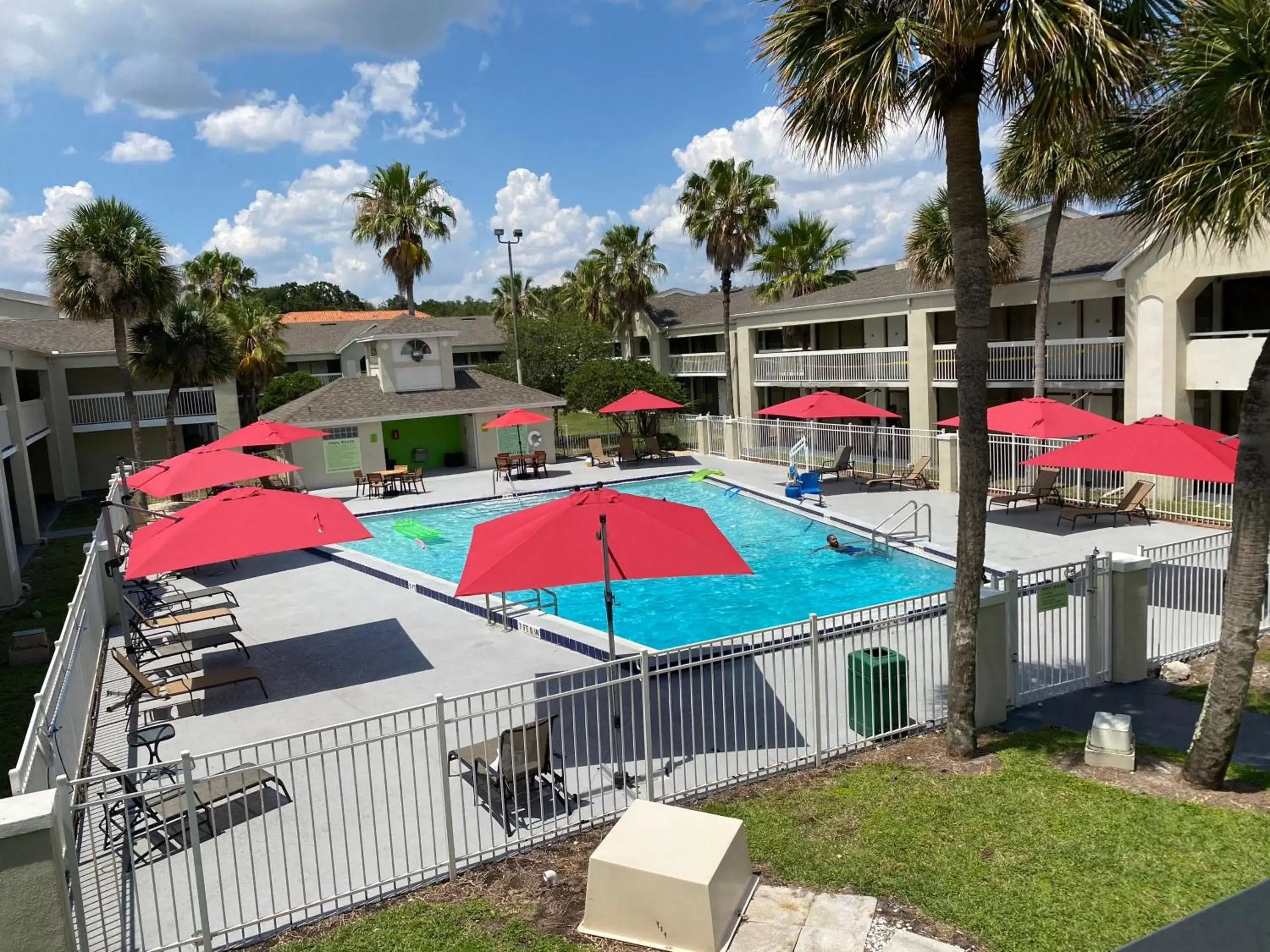 Pool view in Hotel Room Near Disney 4 People