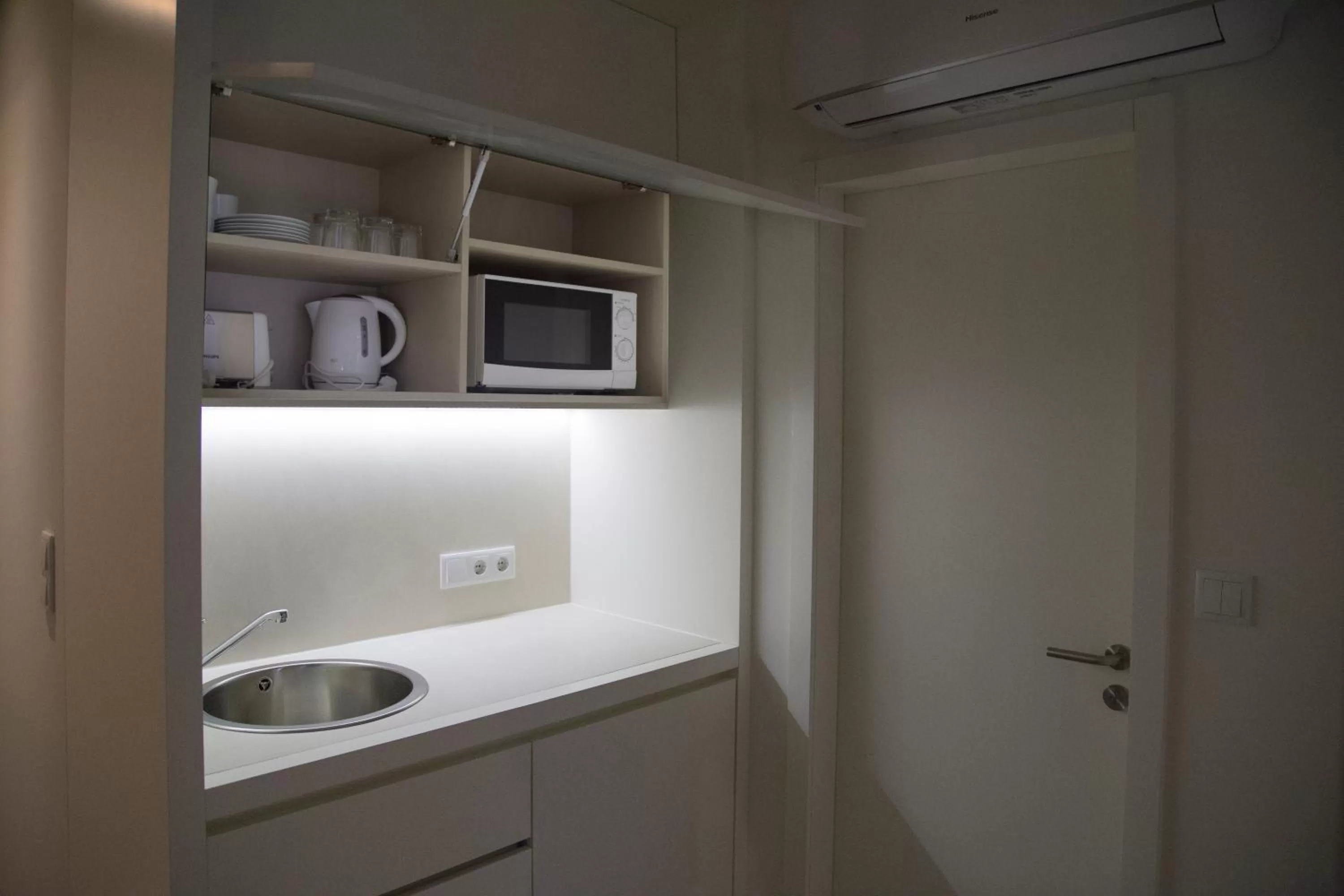 Kitchen or kitchenette in Hotel Spot Family Suites
