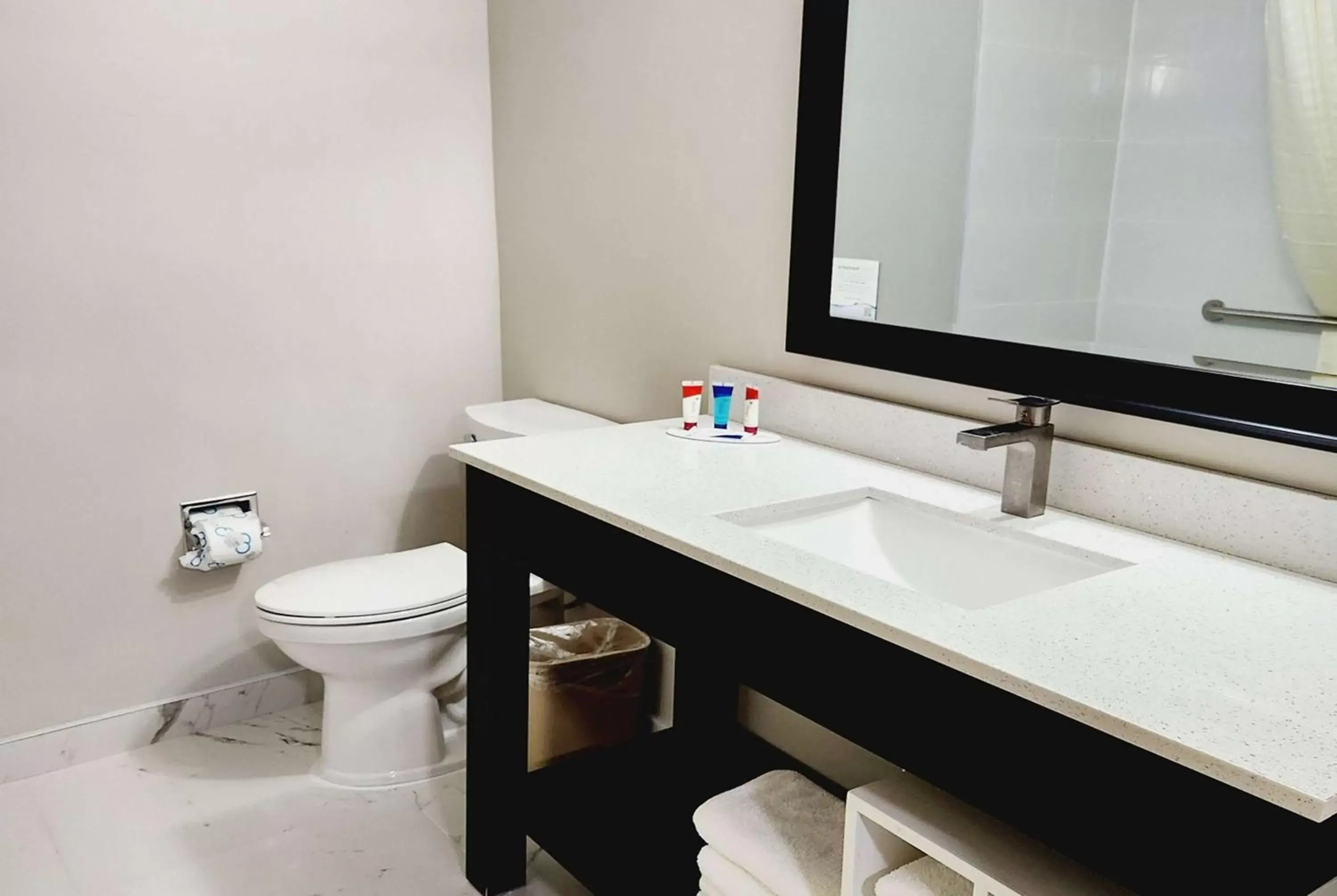 TV and multimedia, Bathroom in Days Inn & Suites by Wyndham Corpus Christi Central
