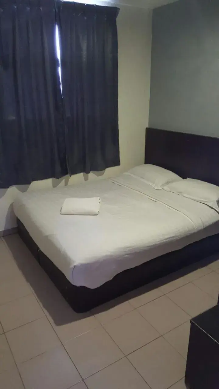 Bed in Tiong Nam Hotel