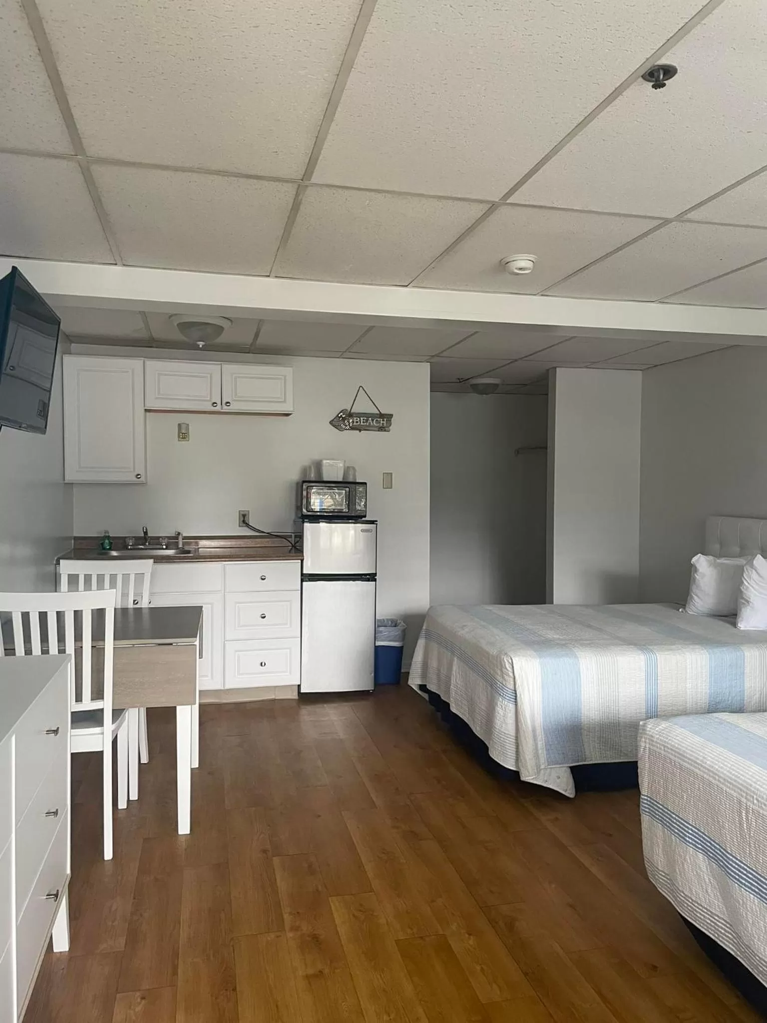 Bed in The Grand Beach Inn