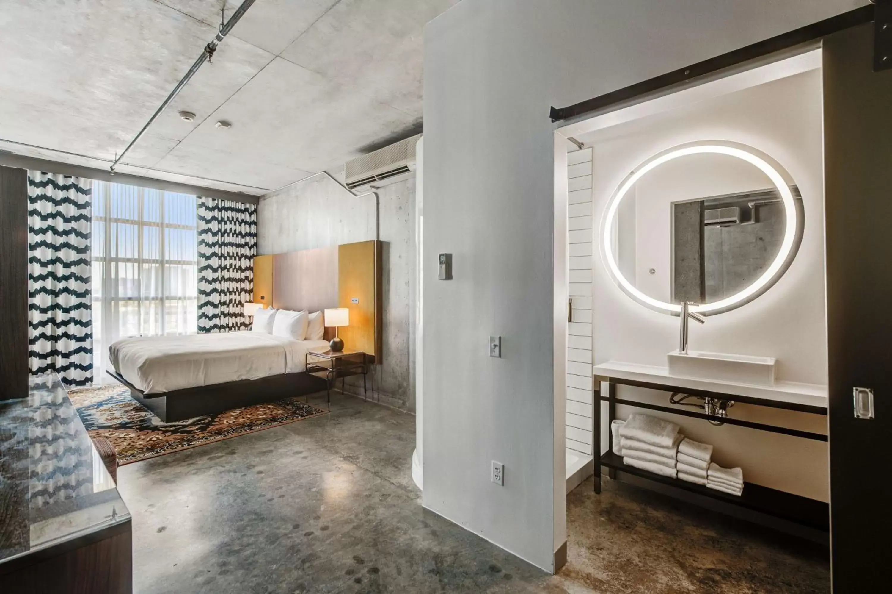 Bed in NYLO Dallas Plano Hotel, Tapestry Collection by Hilton Bed in NYLO Dallas Plano Hotel, Tapestry Collection by Hilton