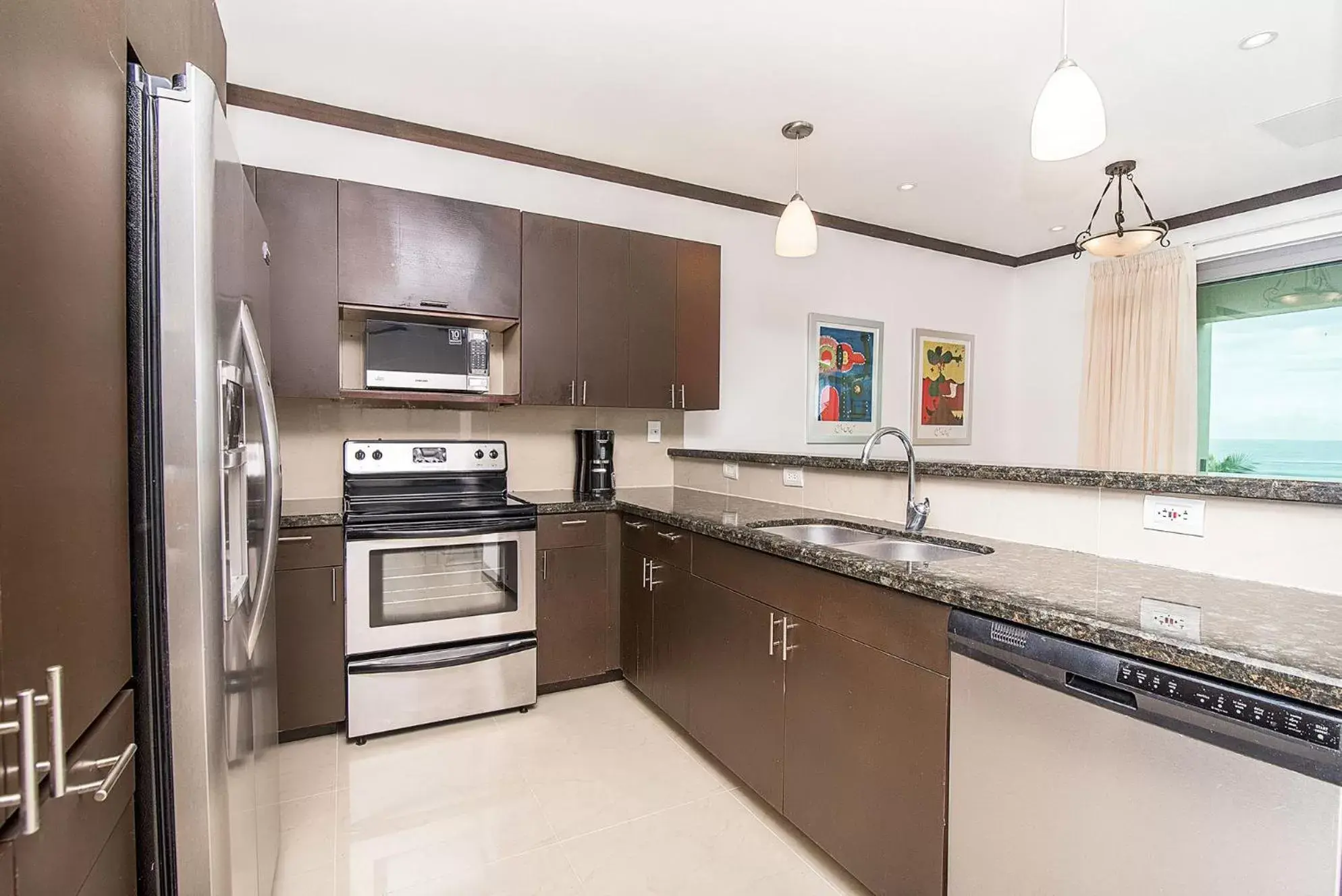 Kitchen/Kitchenette in Best in Jaco Condos at Diamante del Sol