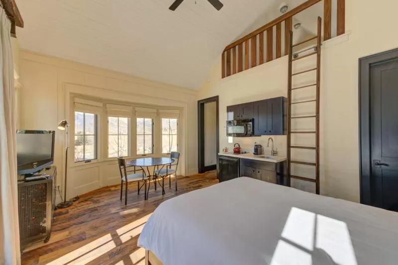 Bedroom, TV/Entertainment Center in South Main Residences by Surf Hotel