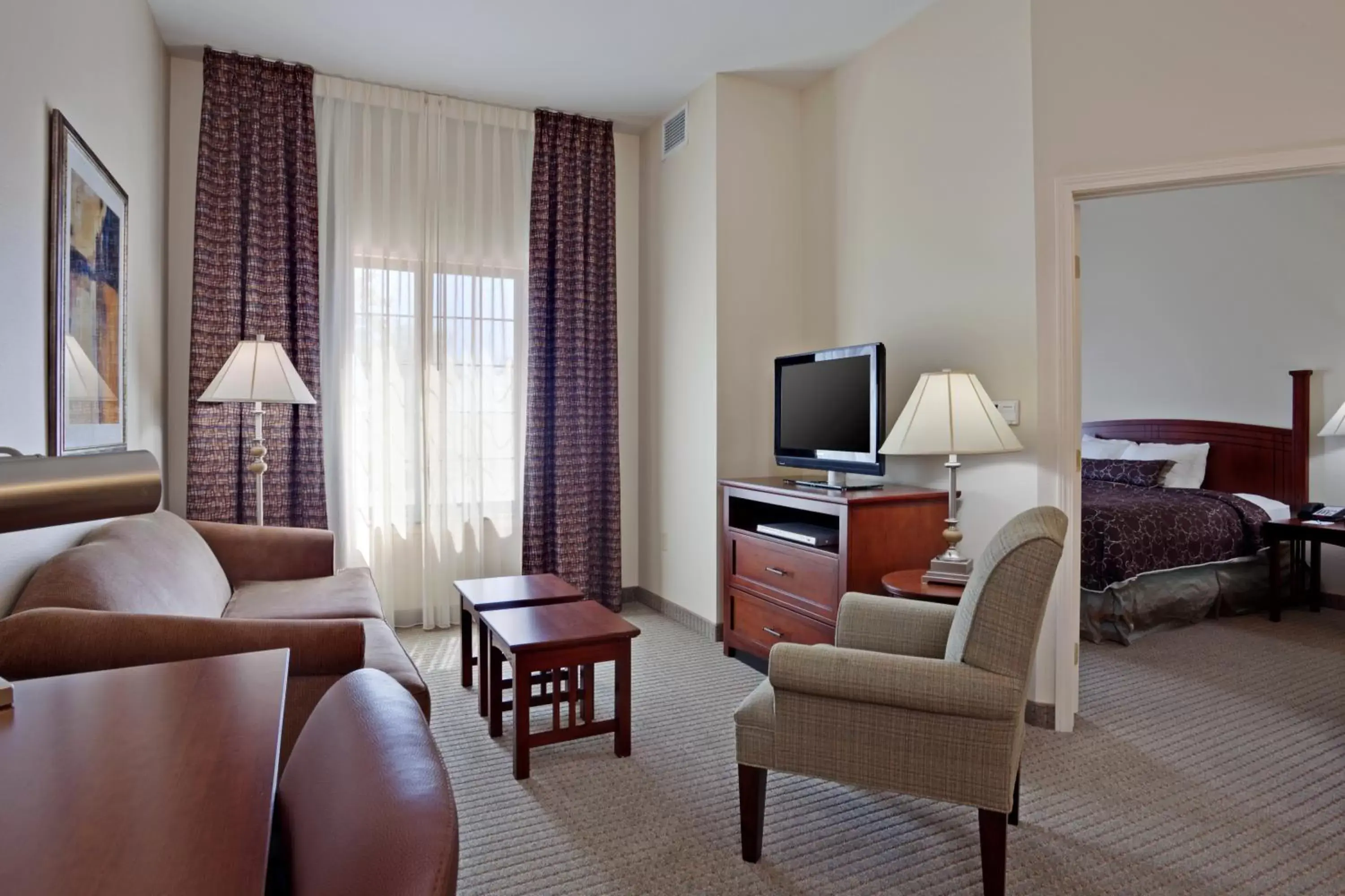 Bedroom, Seating Area in Staybridge Suites Palmdale, an IHG Hotel