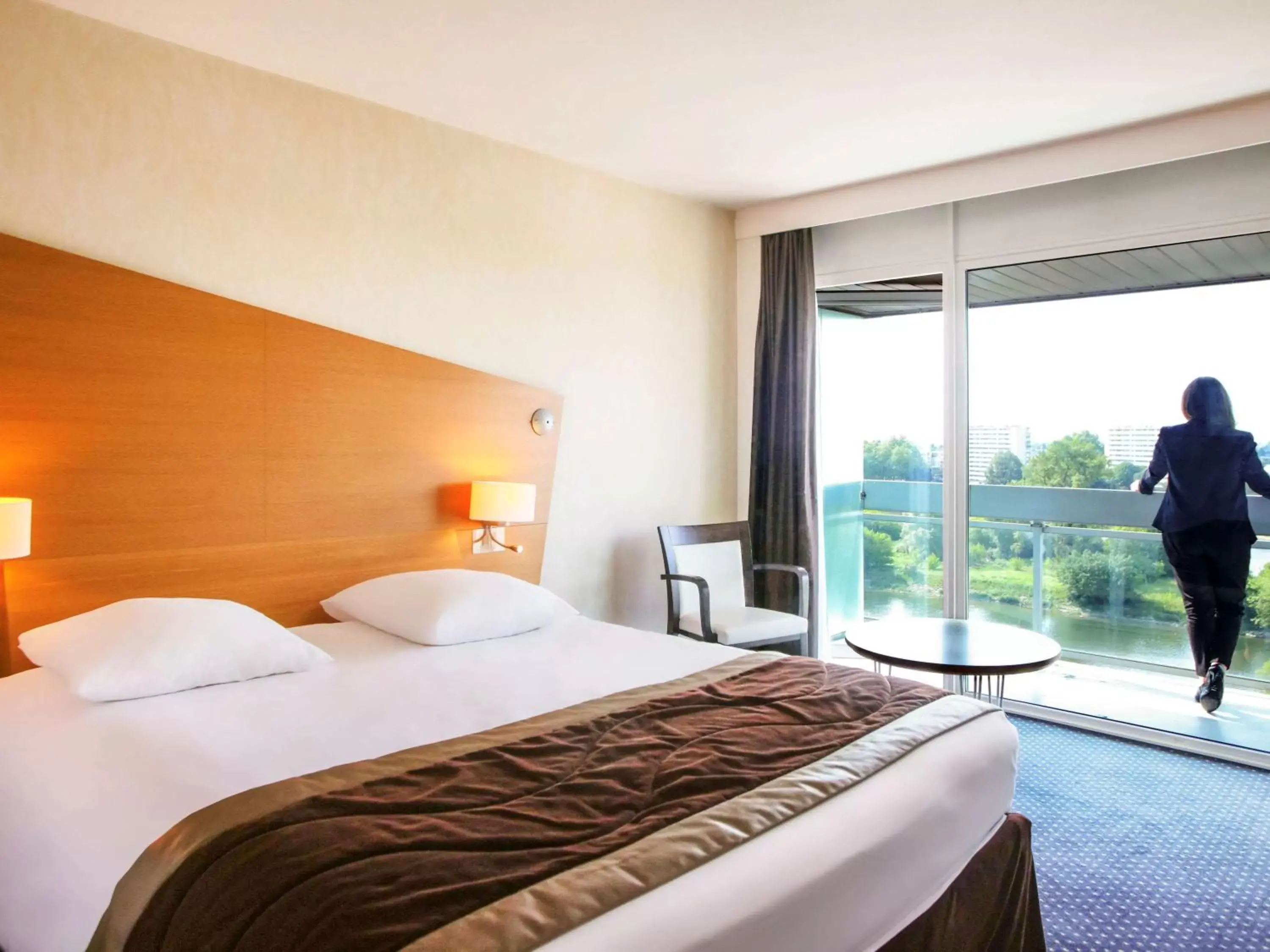 Photo of the whole room, Bed in Mercure Orléans Centre Bords de Loire