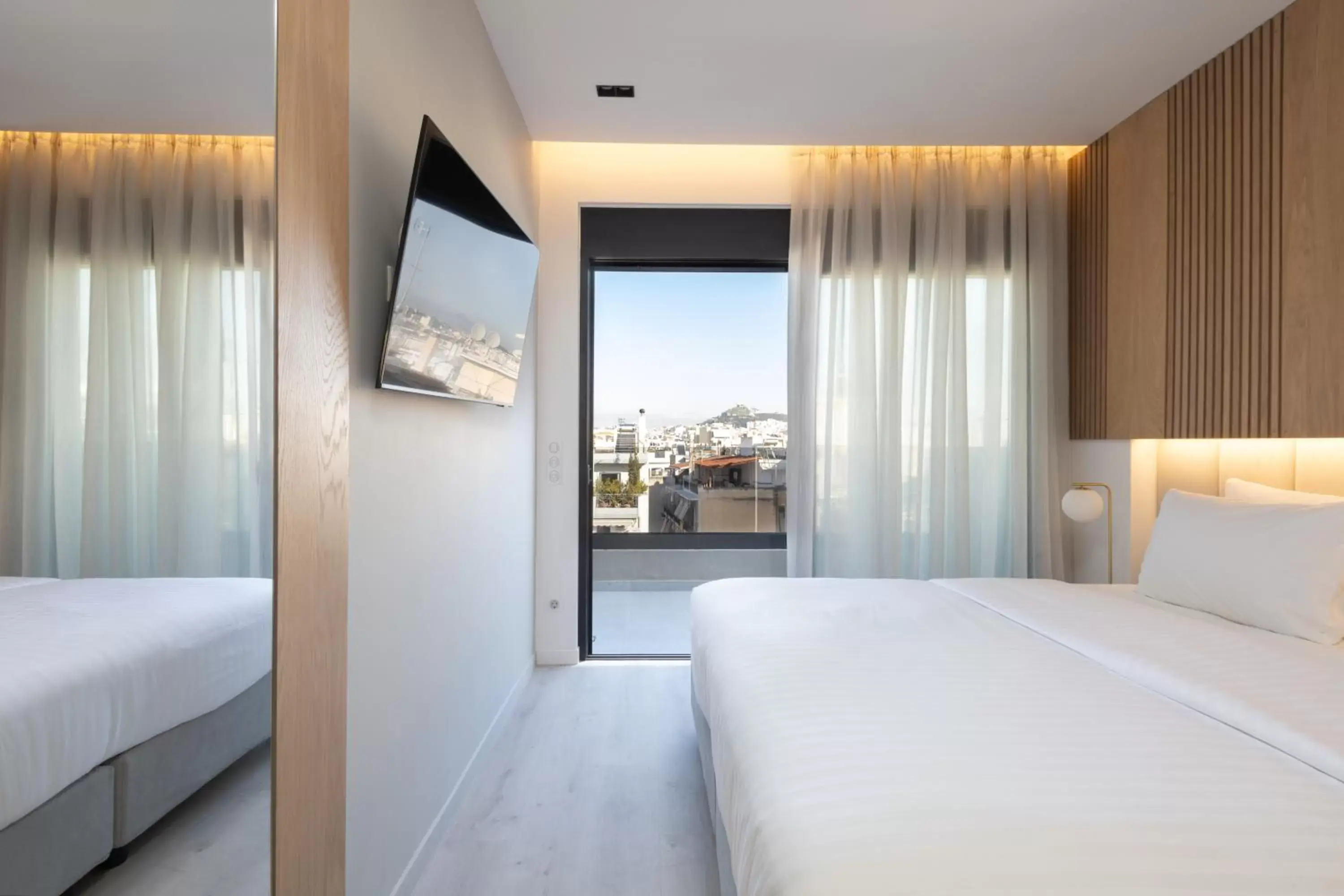 Bed in LUX&EASY Athens Metro Suites