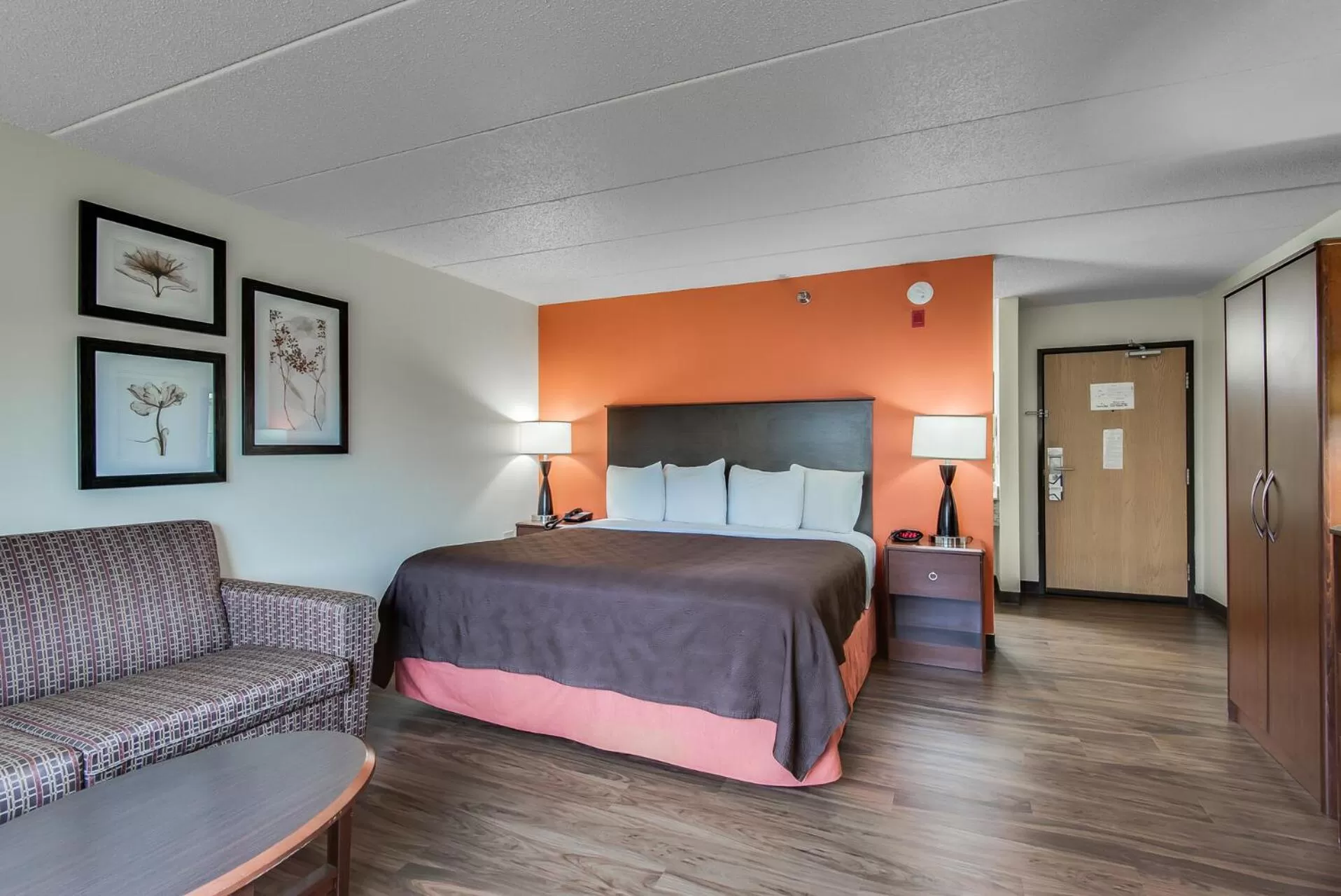 Bed in AmericInn by Wyndham Coon Rapids