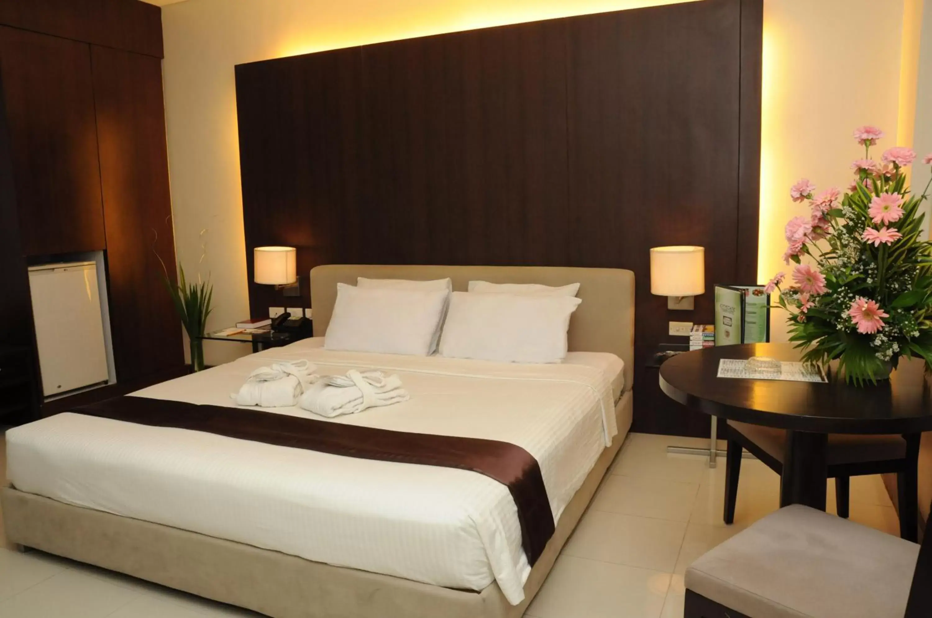 Bed in CityState Tower Hotel