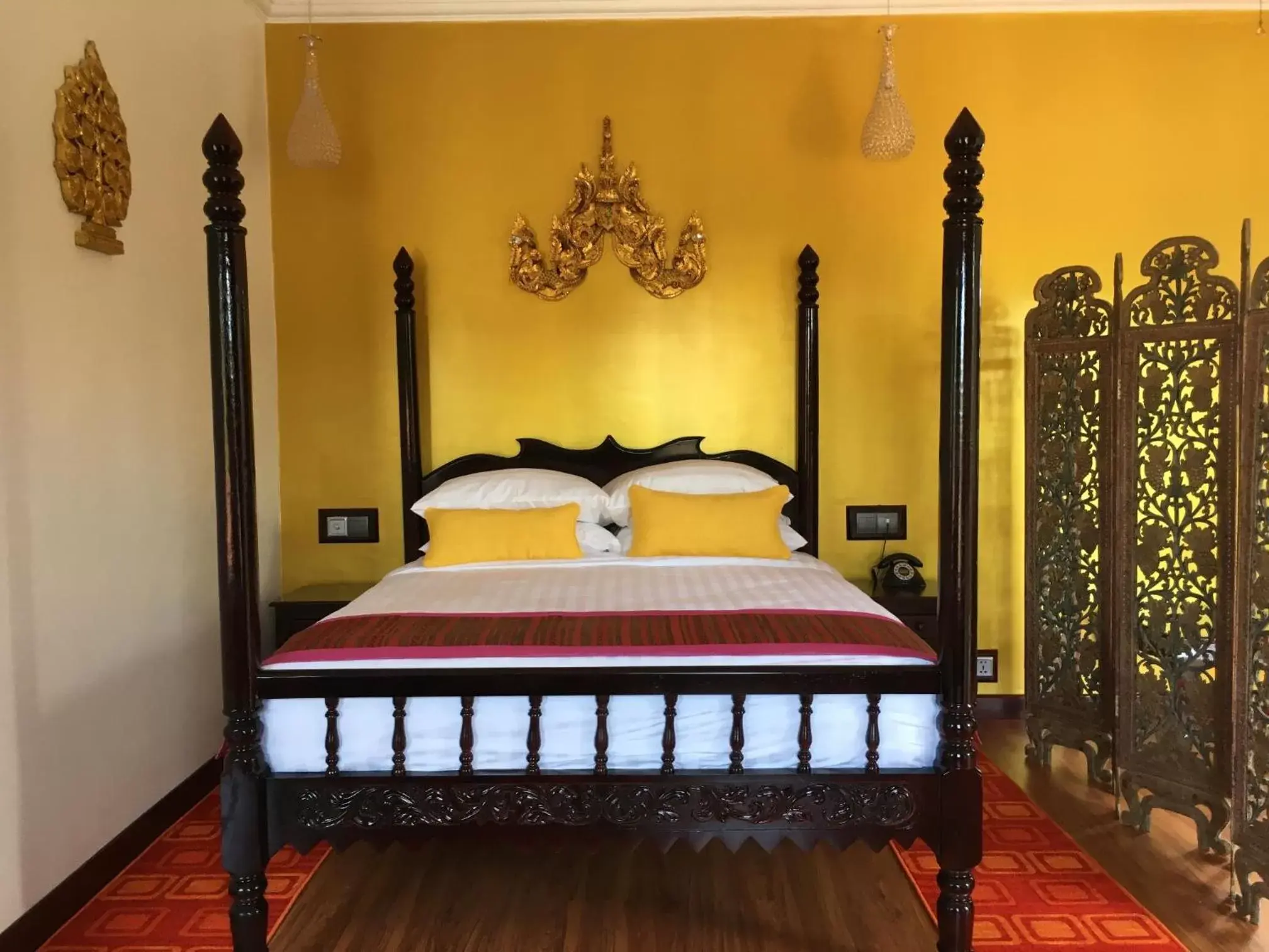 Bed in Beyond Yangon Inn