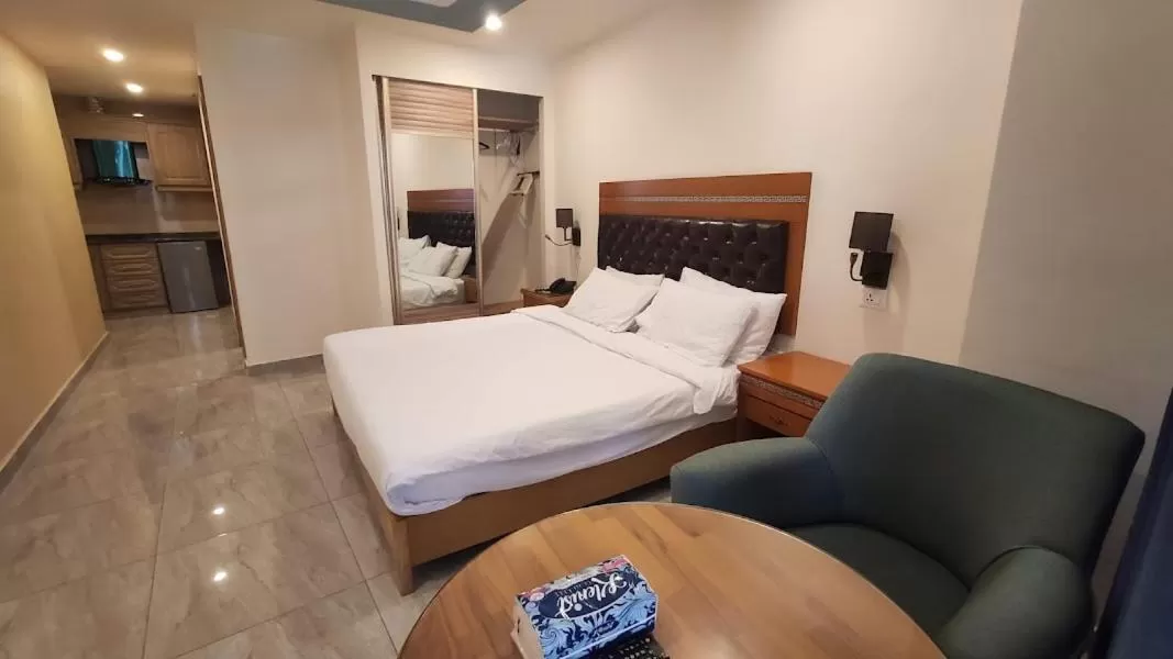 Bed in Jawharet Alswefiah Hotel Suites