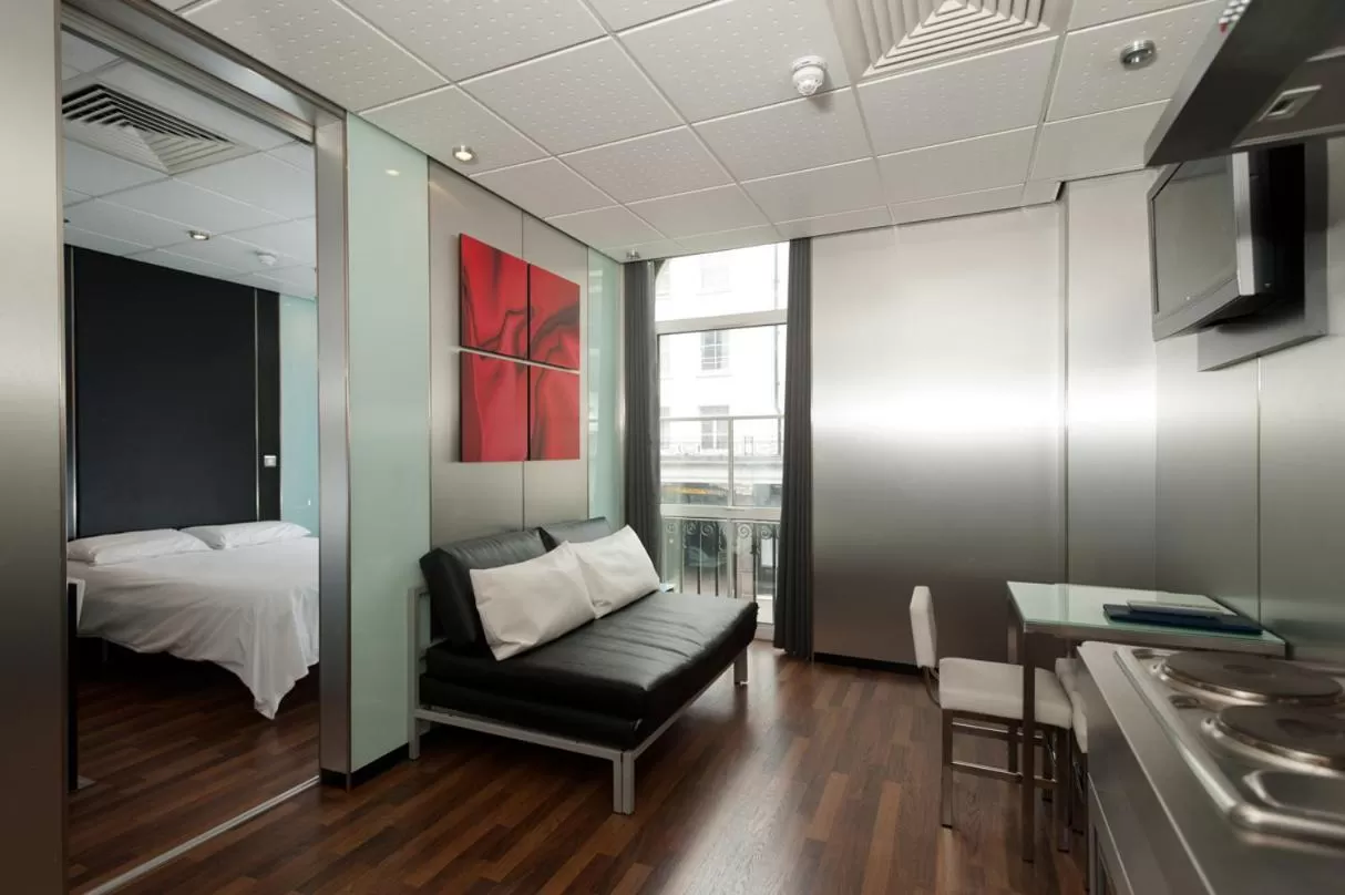 Living room, Bed in Stylotel