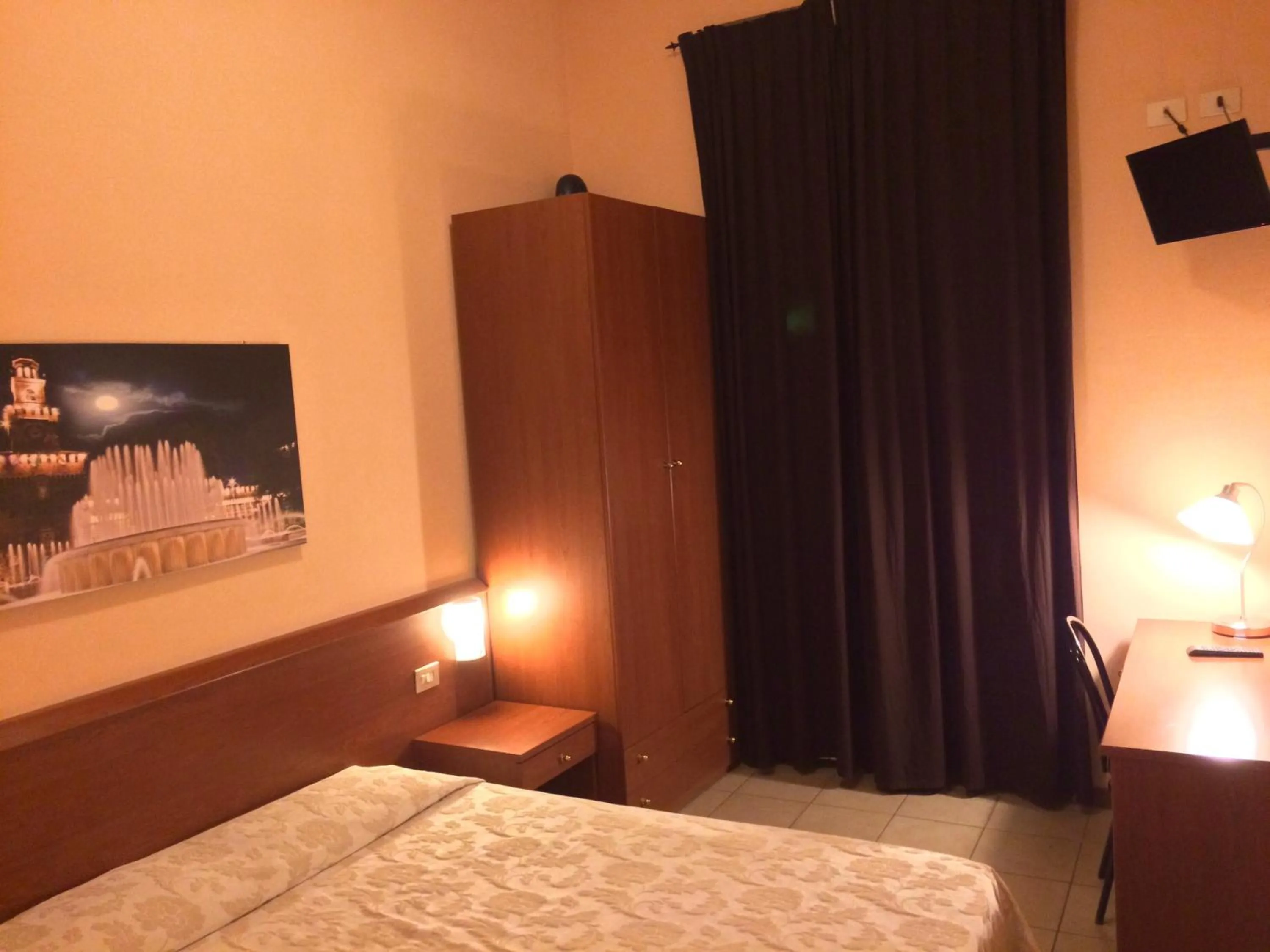 Bed in Hotel Paradiso