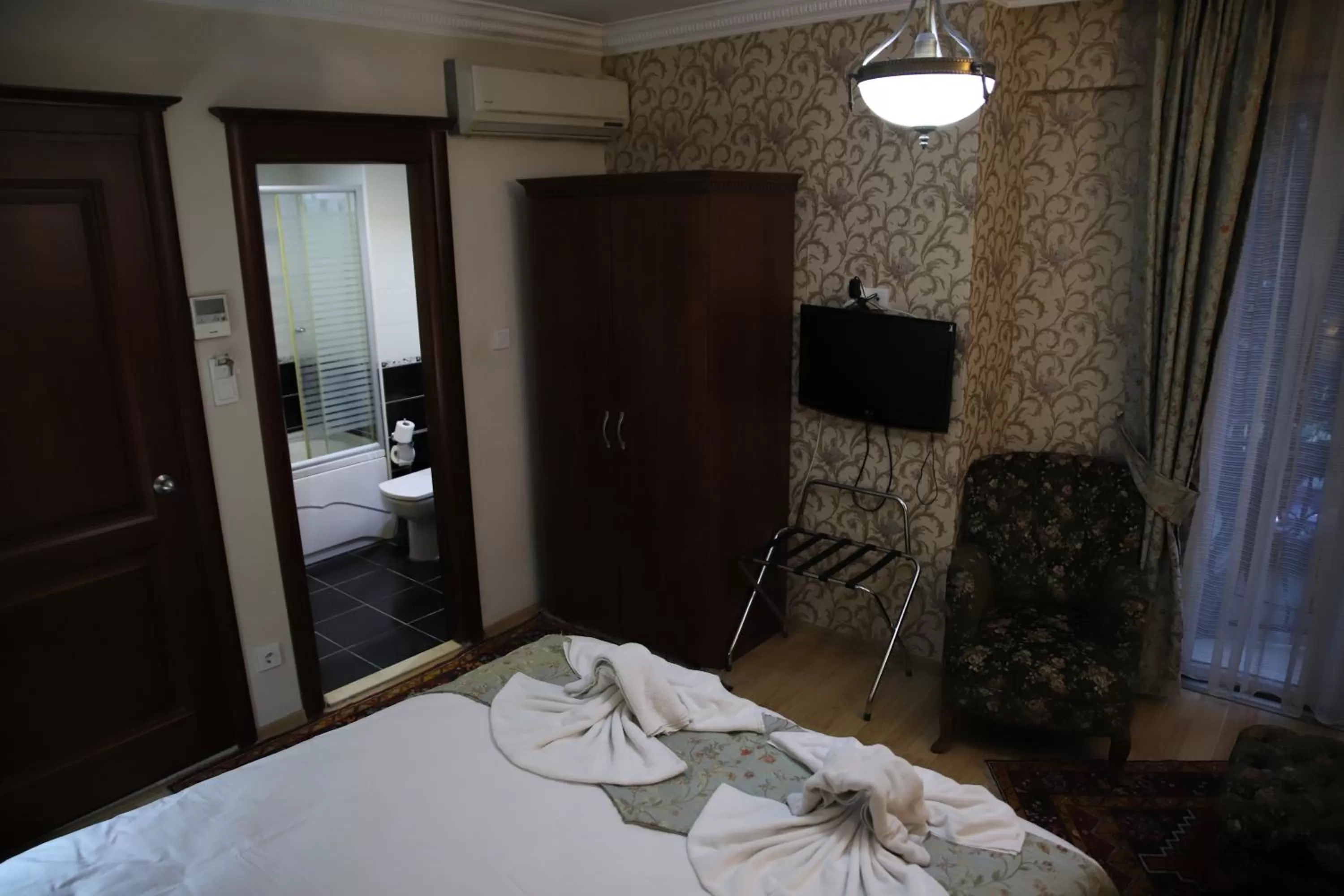 Bed in Basileus Hotel