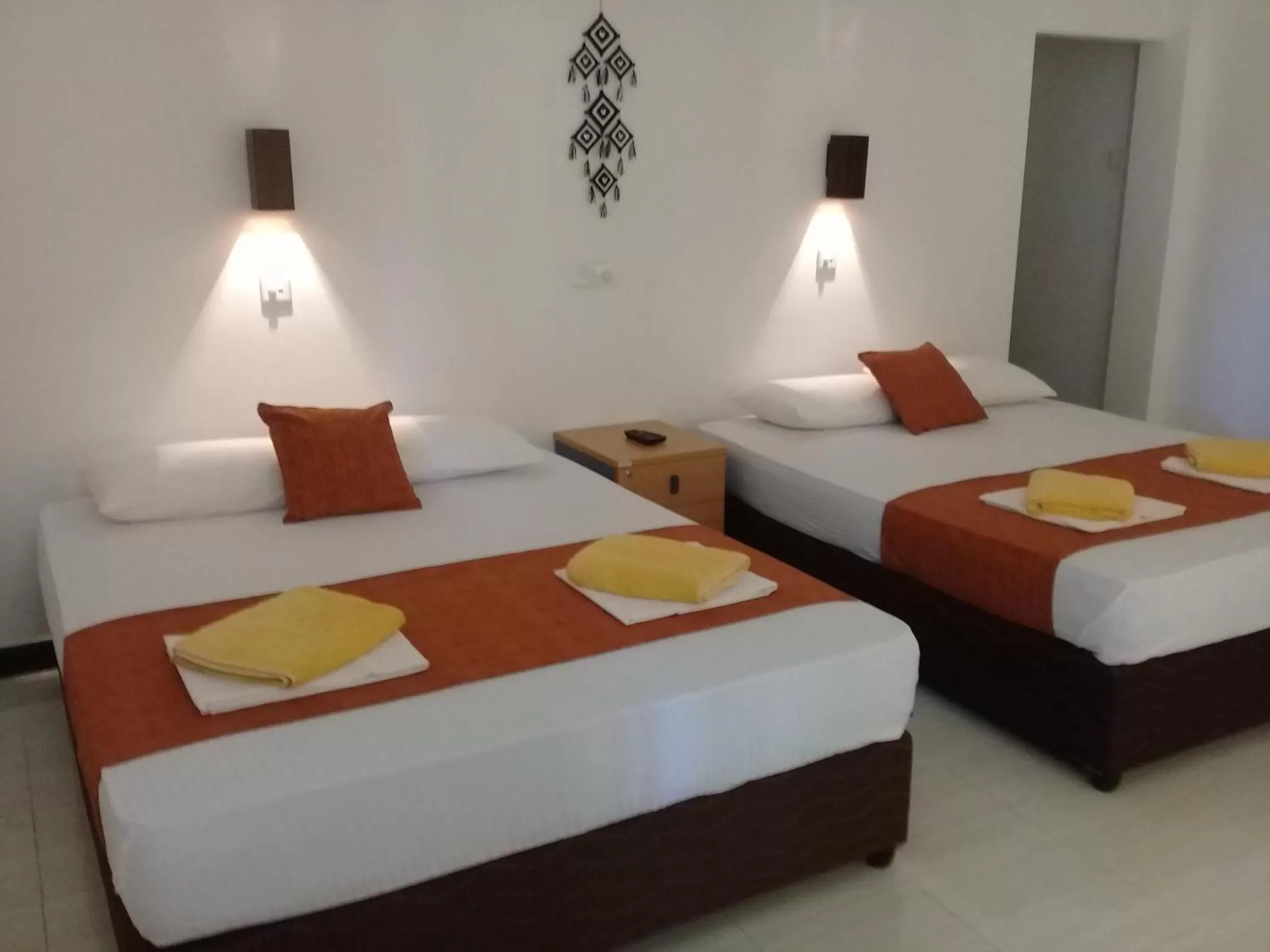 Bed in Kithmi Resort