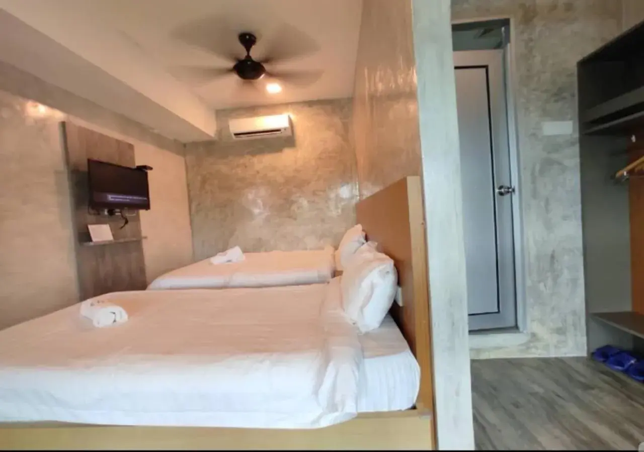 Bed in Rick Resort Teluk Intan