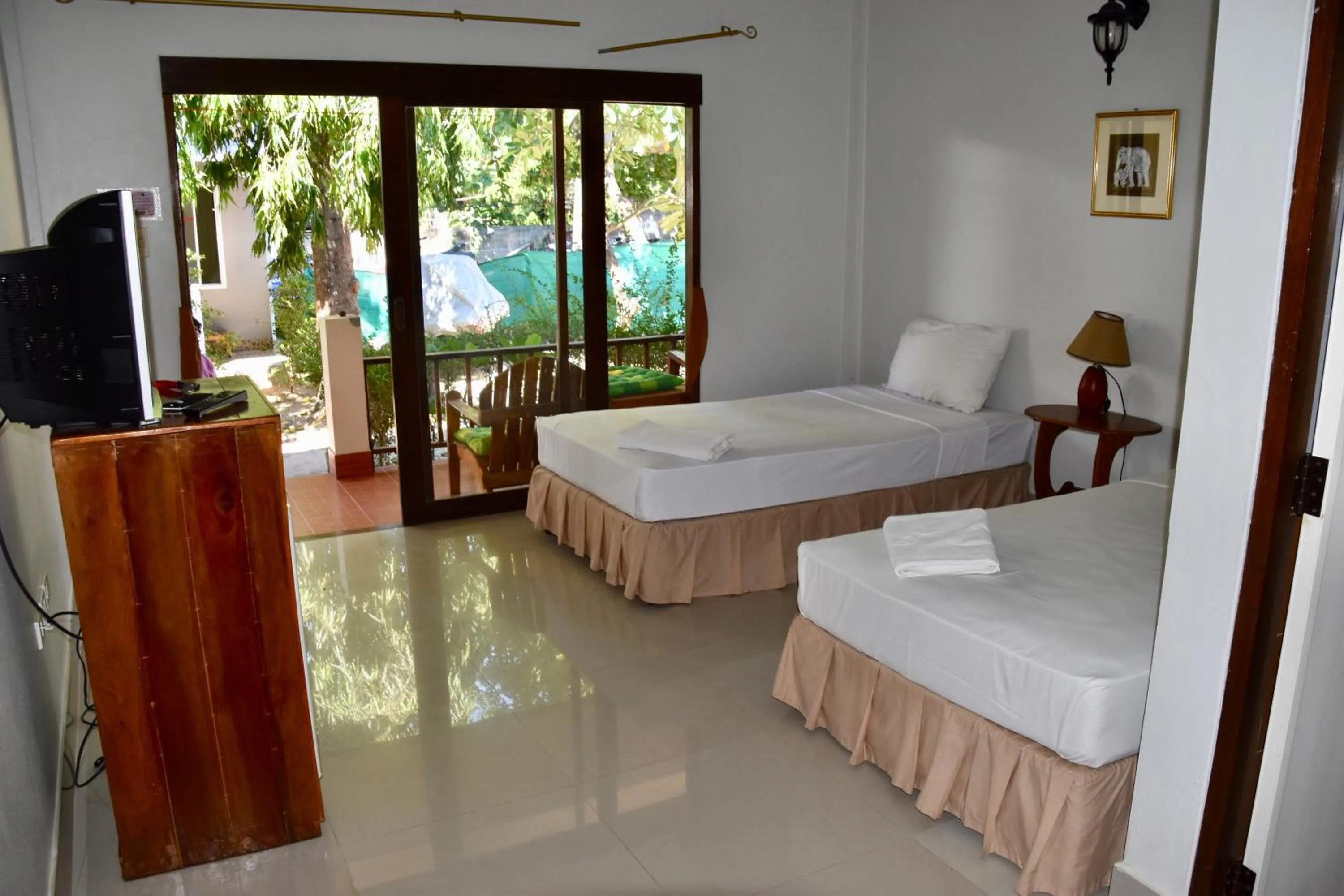 Photo of the whole room, Bed in Magic Resort