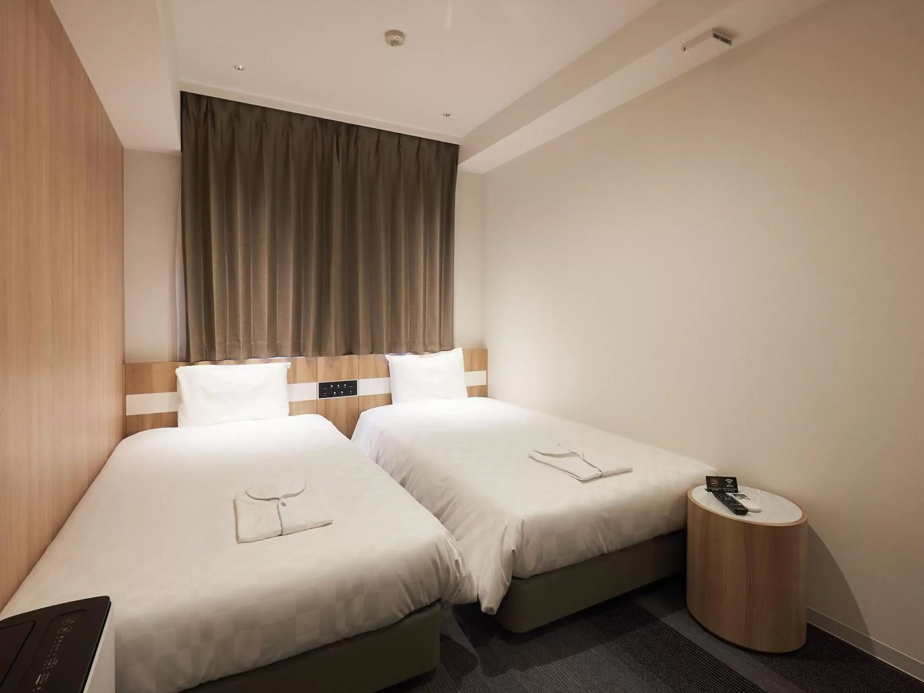 Photo of the whole room, Bed in Henn na Hotel Komatsu Ekimae