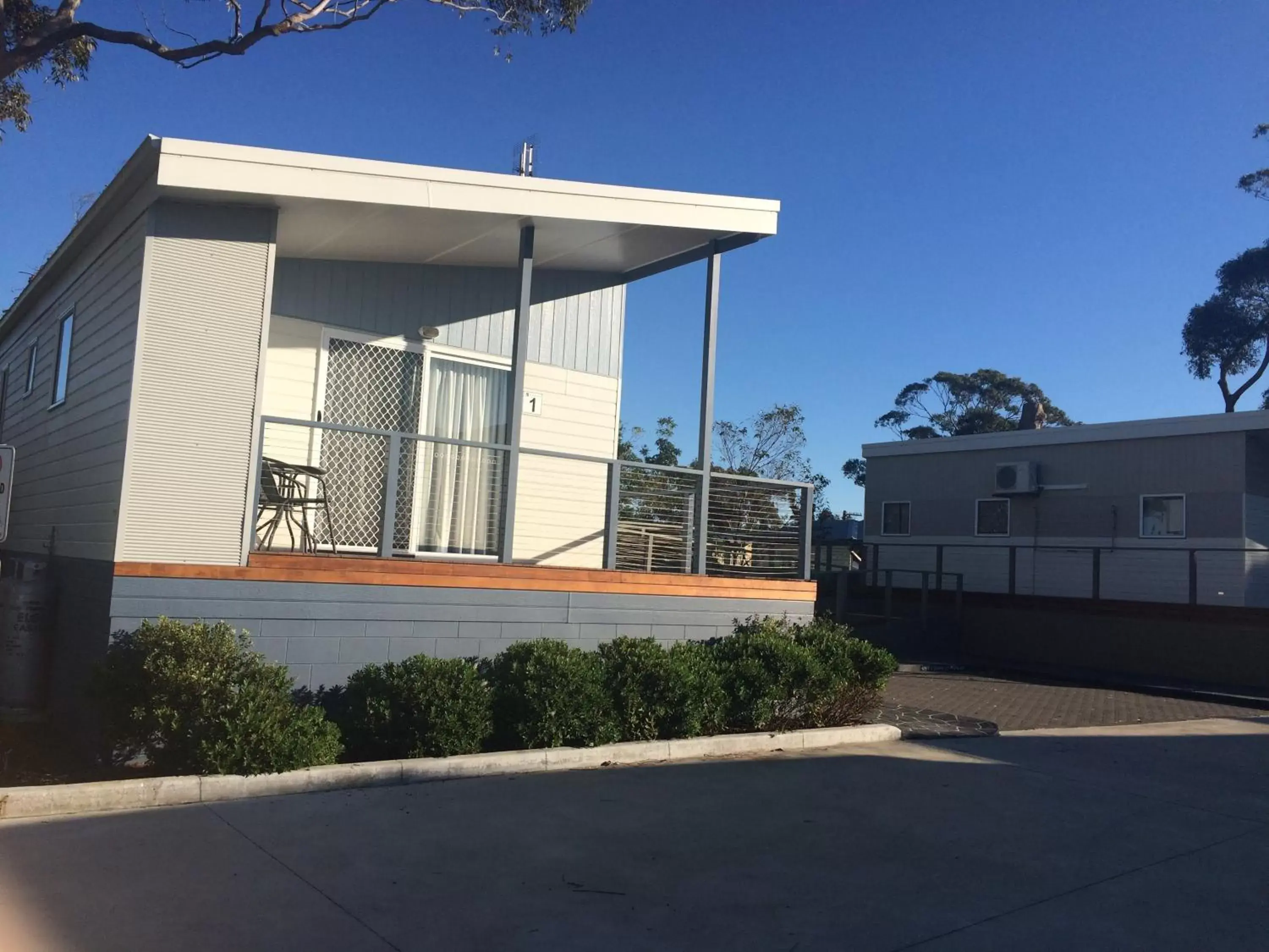 Facade/entrance, Property Building in Peace Resorts - Jervis Bay Holiday Cabins in Sussex Inlet