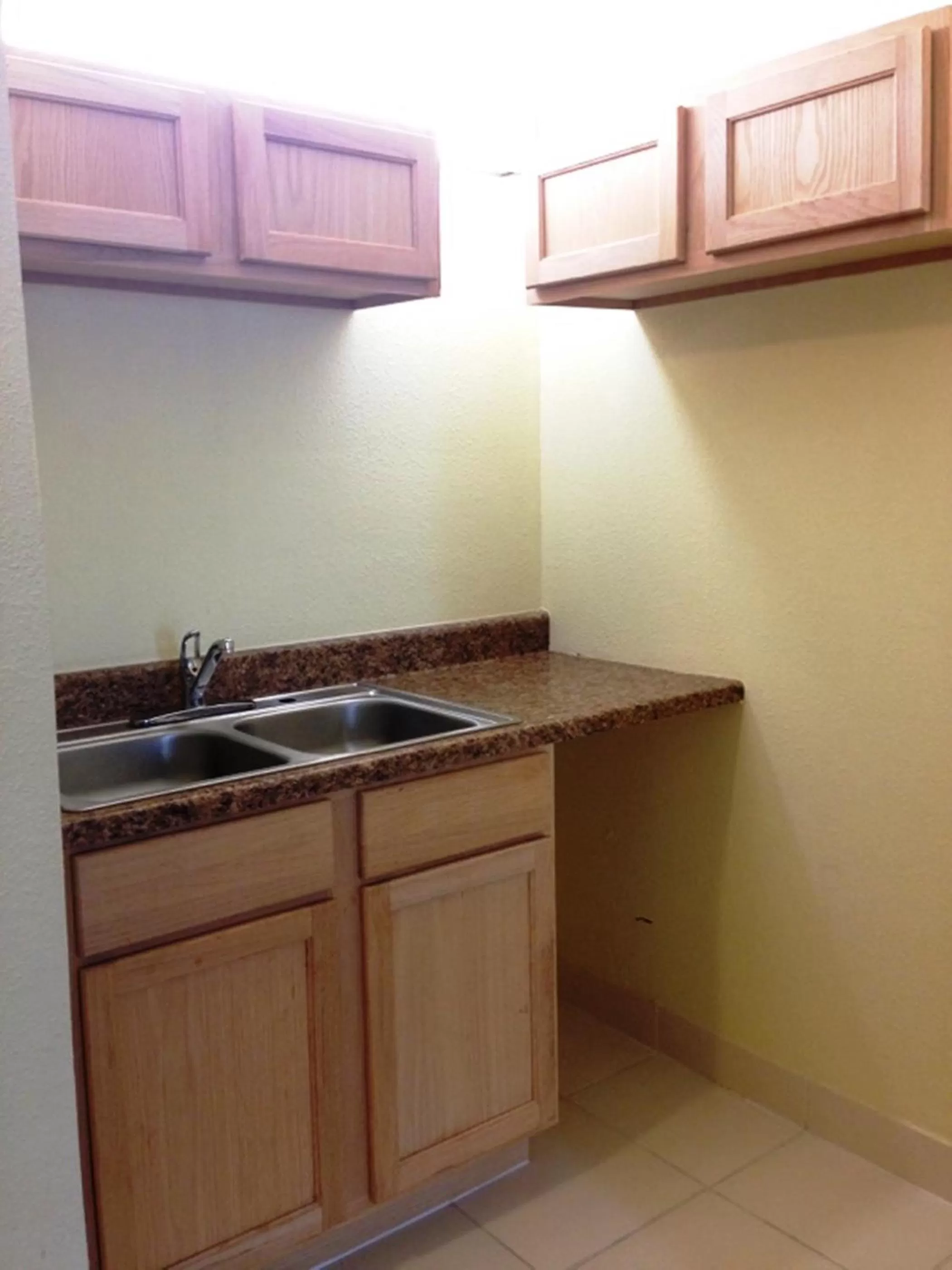 Kitchen or kitchenette in Days Inn by Wyndham Irving Grapevine DFW Airport North