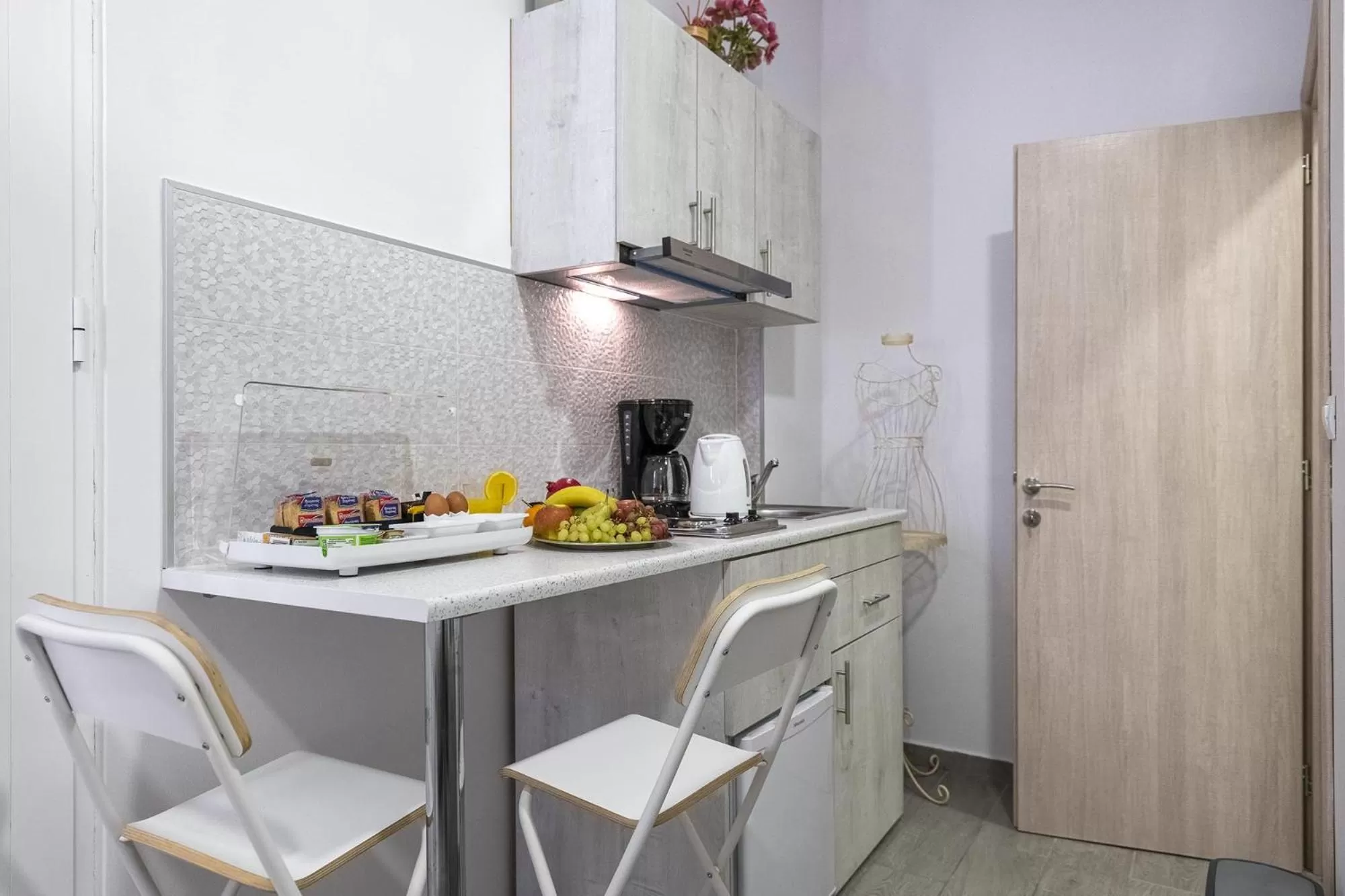 Kitchen or kitchenette in Comfort Stay Athens Airport Hotel - FREE shuttle from and to the airport