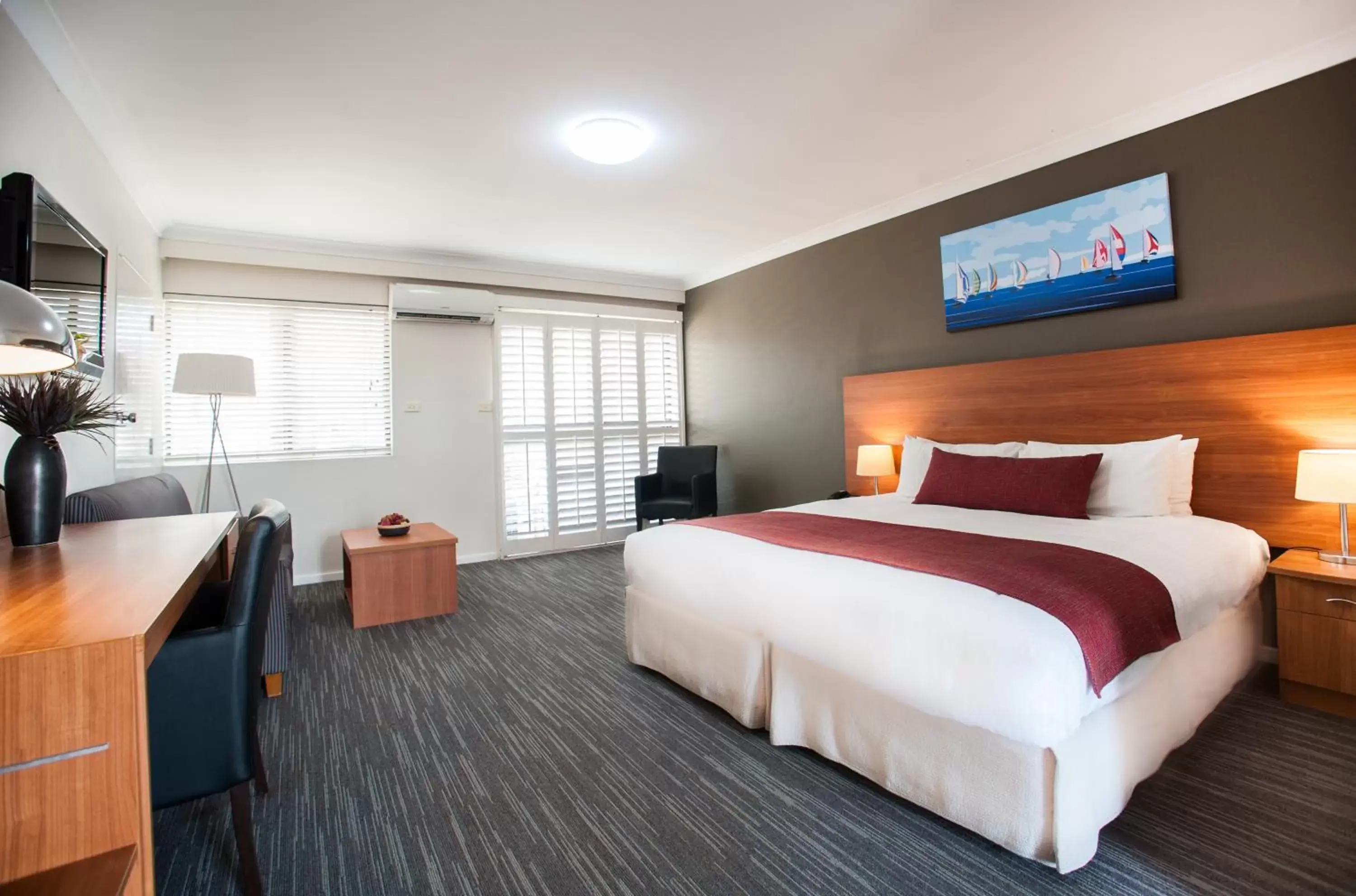Photo of the whole room, Bed in Ramada Hotel & Suites by Wyndham Cabramatta