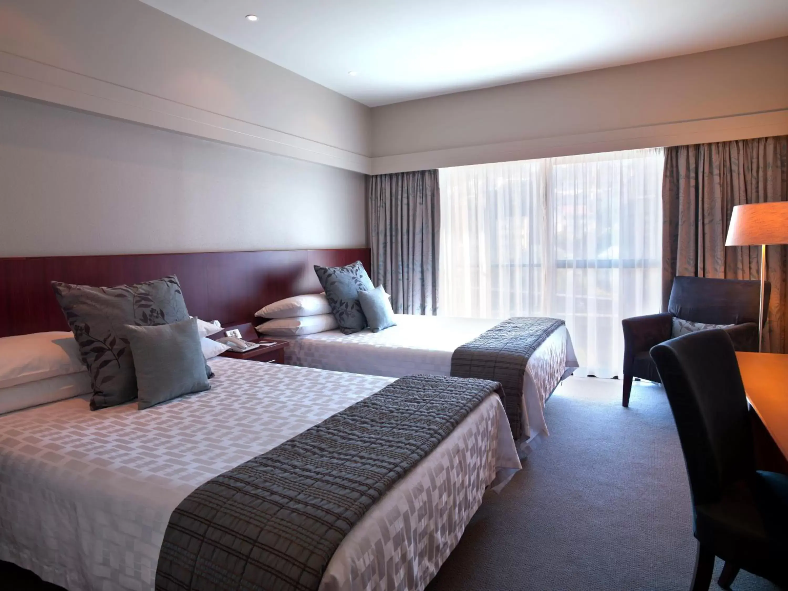 Bed in James Cook Hotel Grand Chancellor