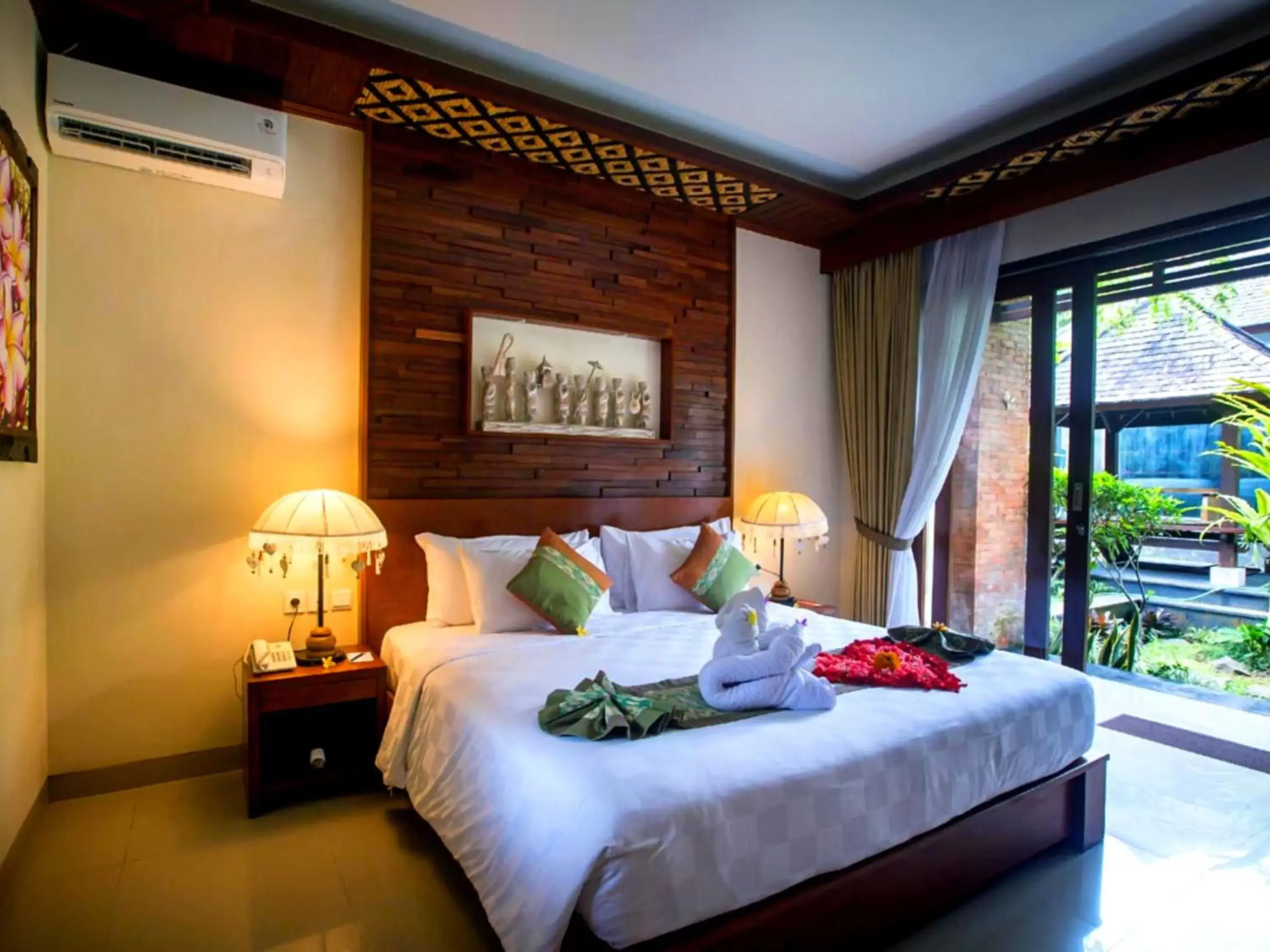 Bed in Awatara Boutique Resort Ubud