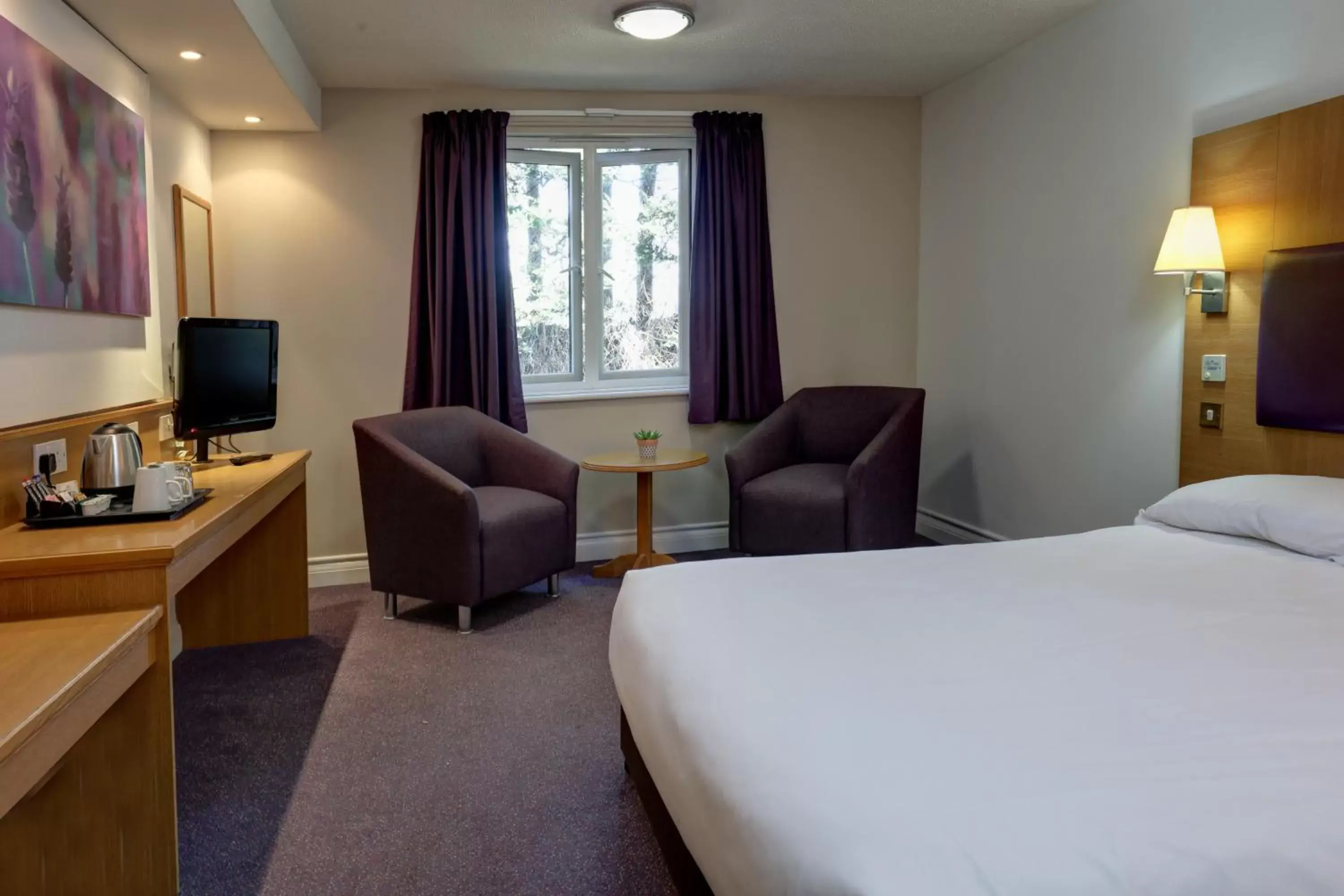 Bed, TV/Entertainment Center in Orchid Epsom; Sure Hotel Collection by Best Western