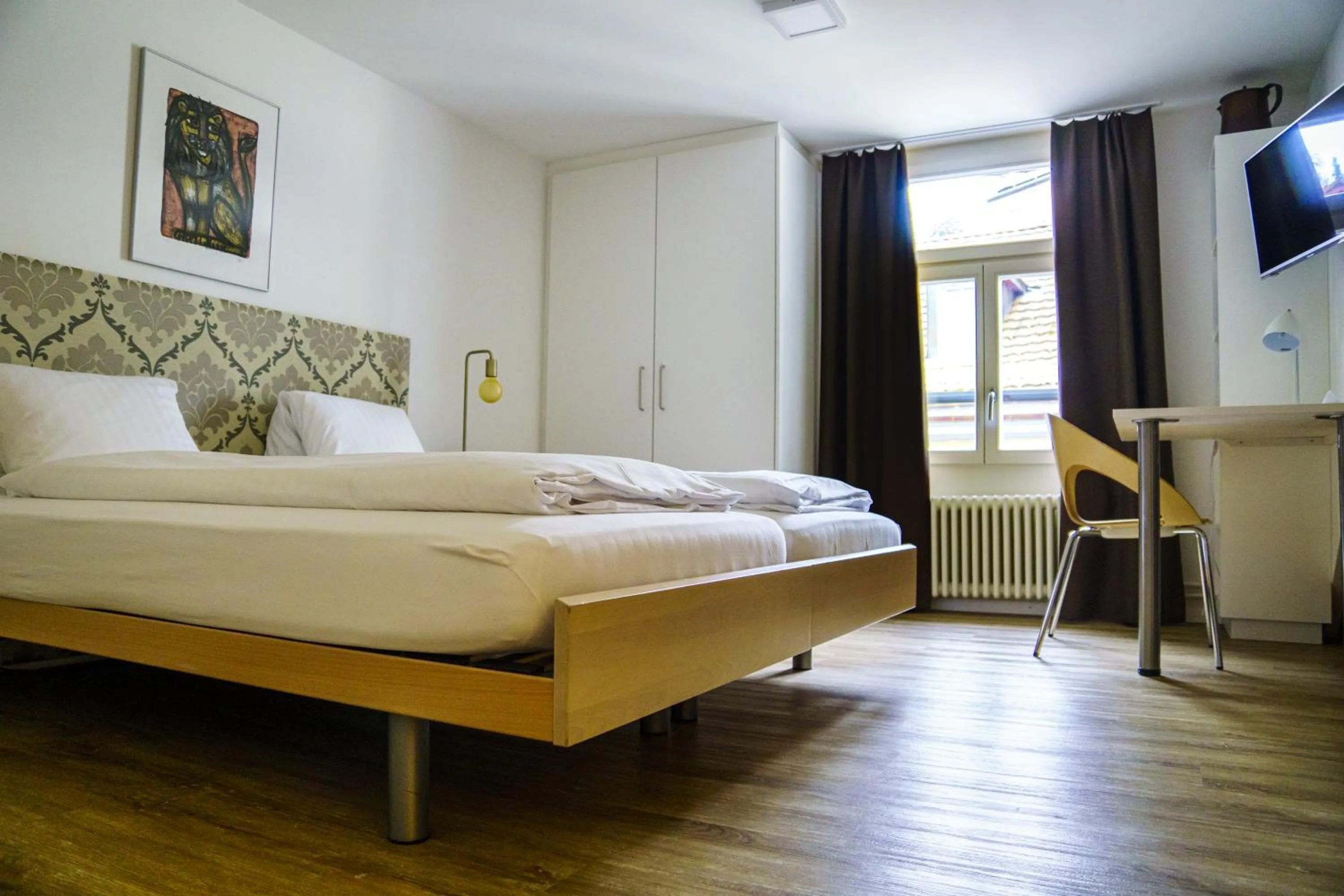 Bed in Hotel Vadian Garni