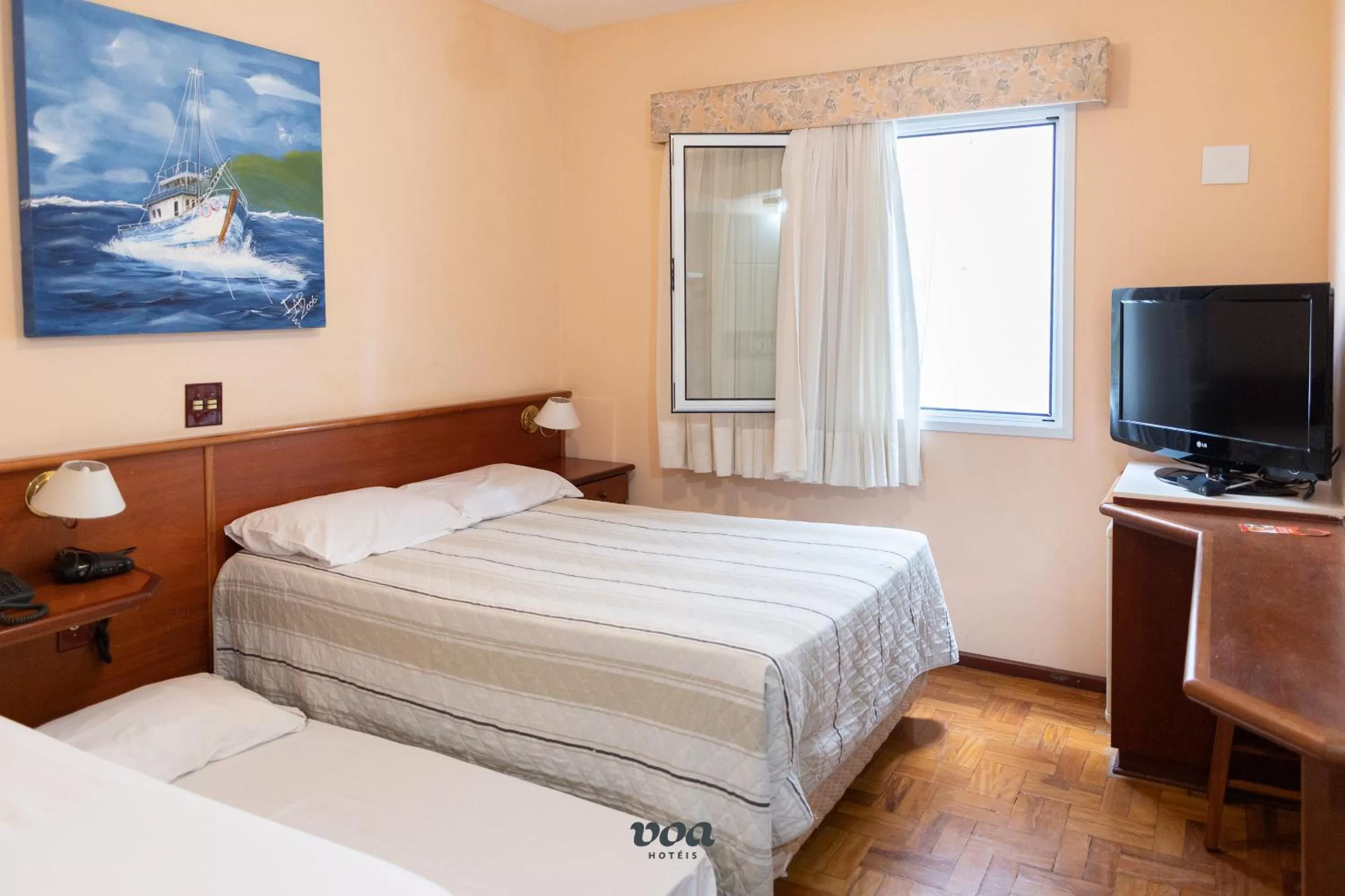 Economy Quadruple Room in VOA Plazza Hotel