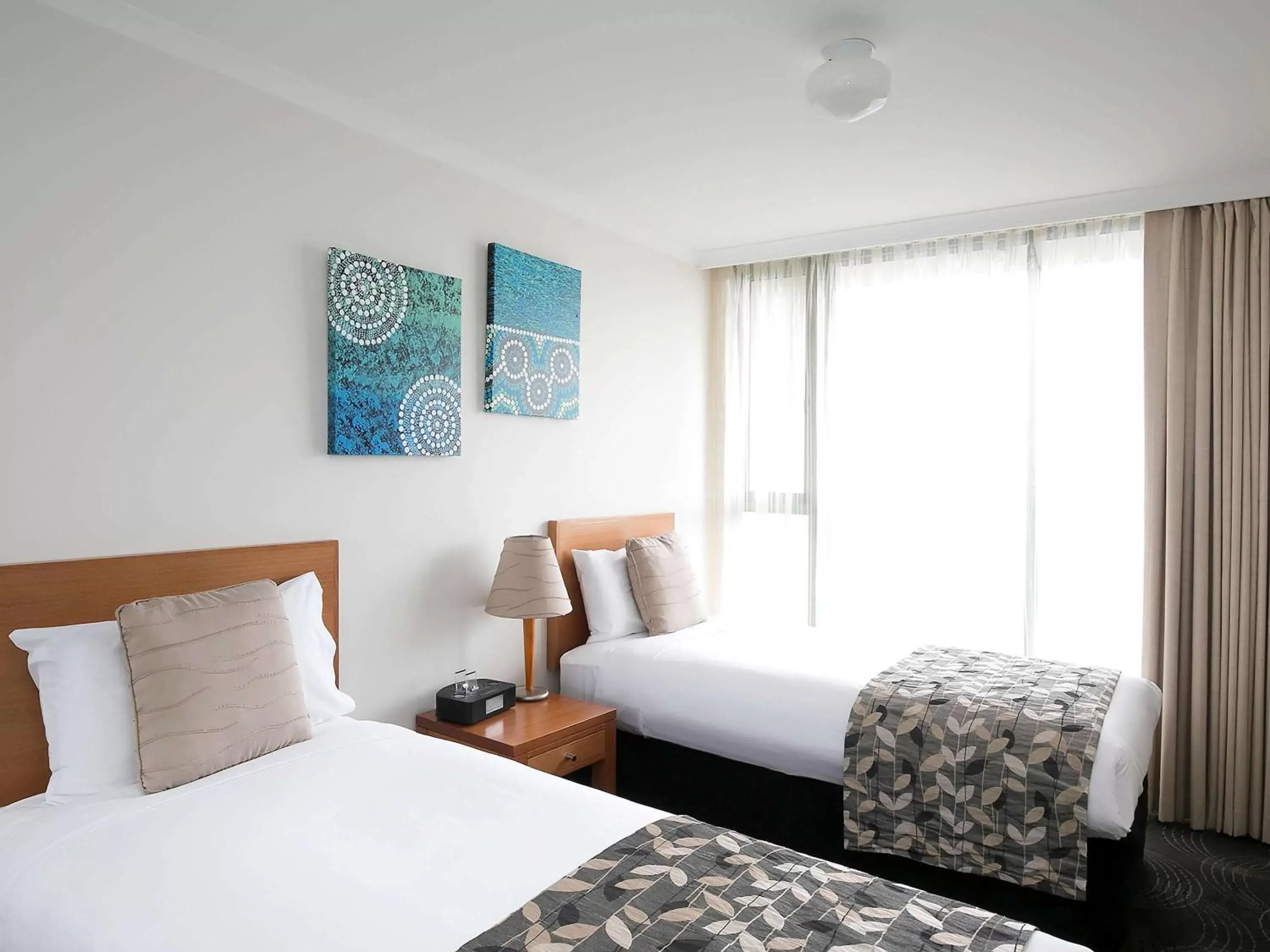 Photo of the whole room, Bed in The Sebel Sydney Chatswood